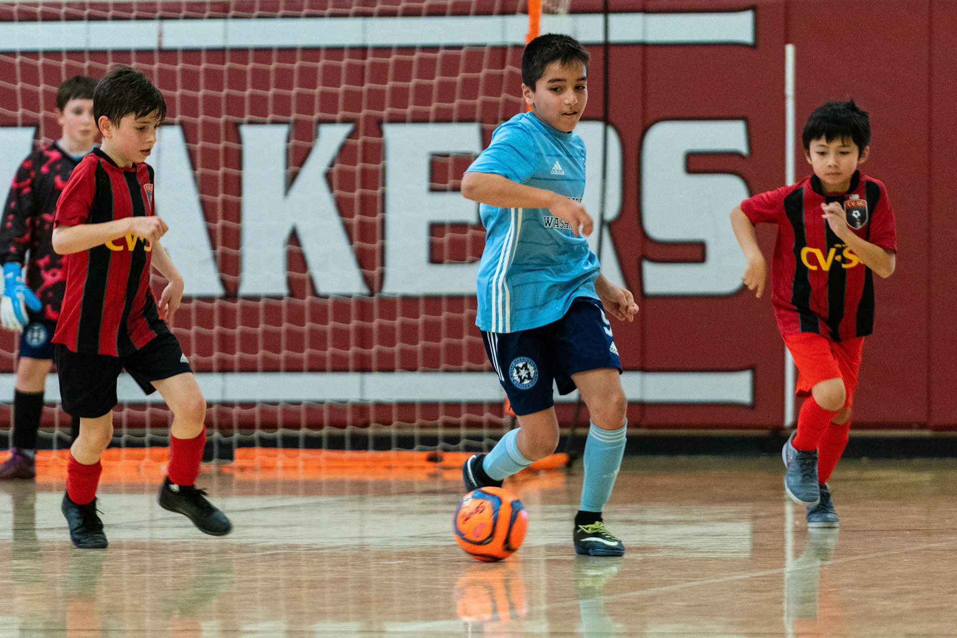 Caleb works his way up court as Mt Washington defeats Charles Village Black 11-3 on Saturday, February 18, 2023.