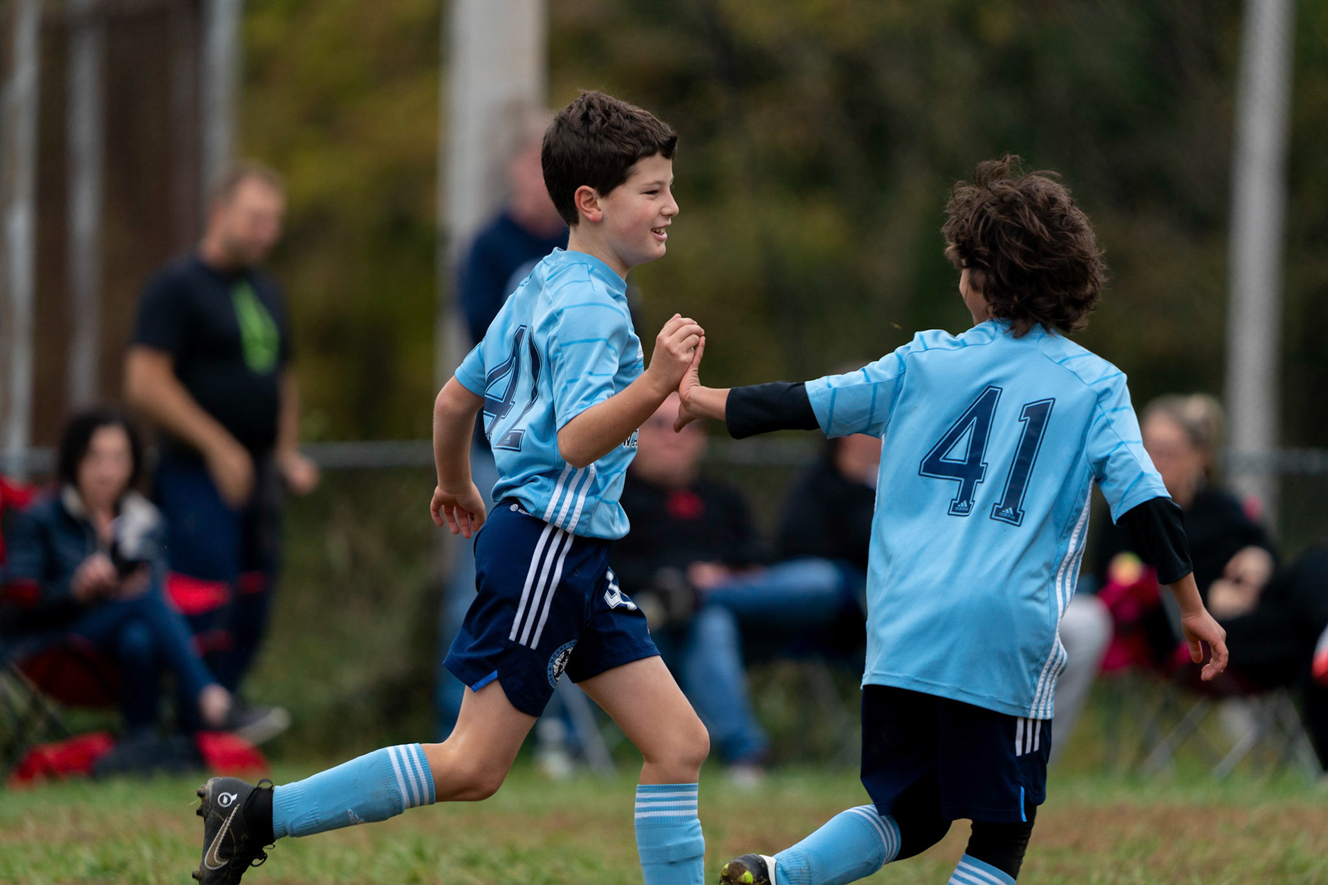 Cameron celebrates his goal with Anderson in the first half of Mt Washington's 3-1 home victory over Northwest SC on October 23, 2022.