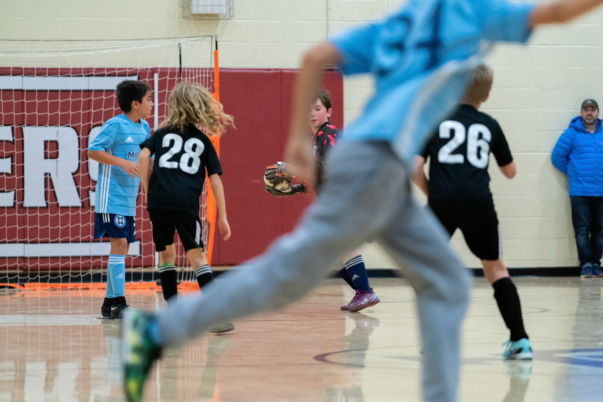 Graham looks to get the ball to Luke in the second half of the Mt. Washington Soccer 22/23 12-5 victory over  Towson United. Each player scored.