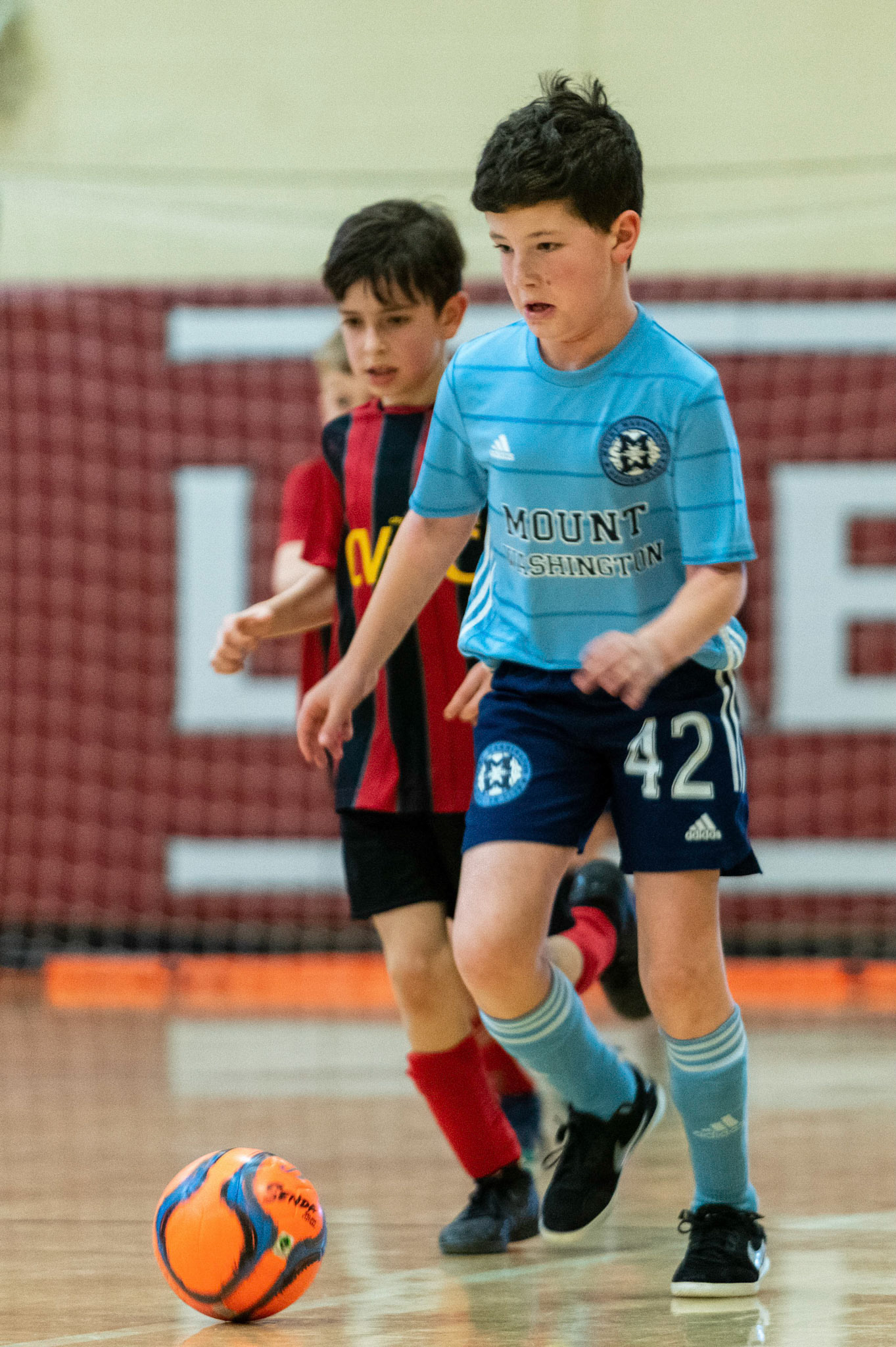 Cameron heads up court as Mt Washington defeats Charles Village Black 11-3 on Saturday, February 18, 2023.