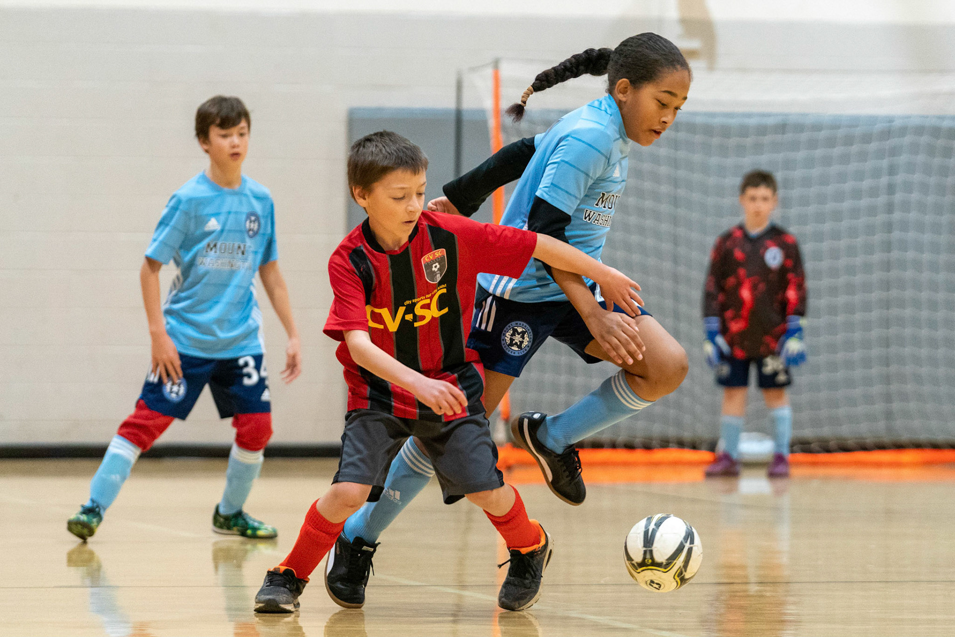 Drake gets past his defender in the first half of the Mt. Washington Soccer 22/23 11-3 victory over  Charles Village.
