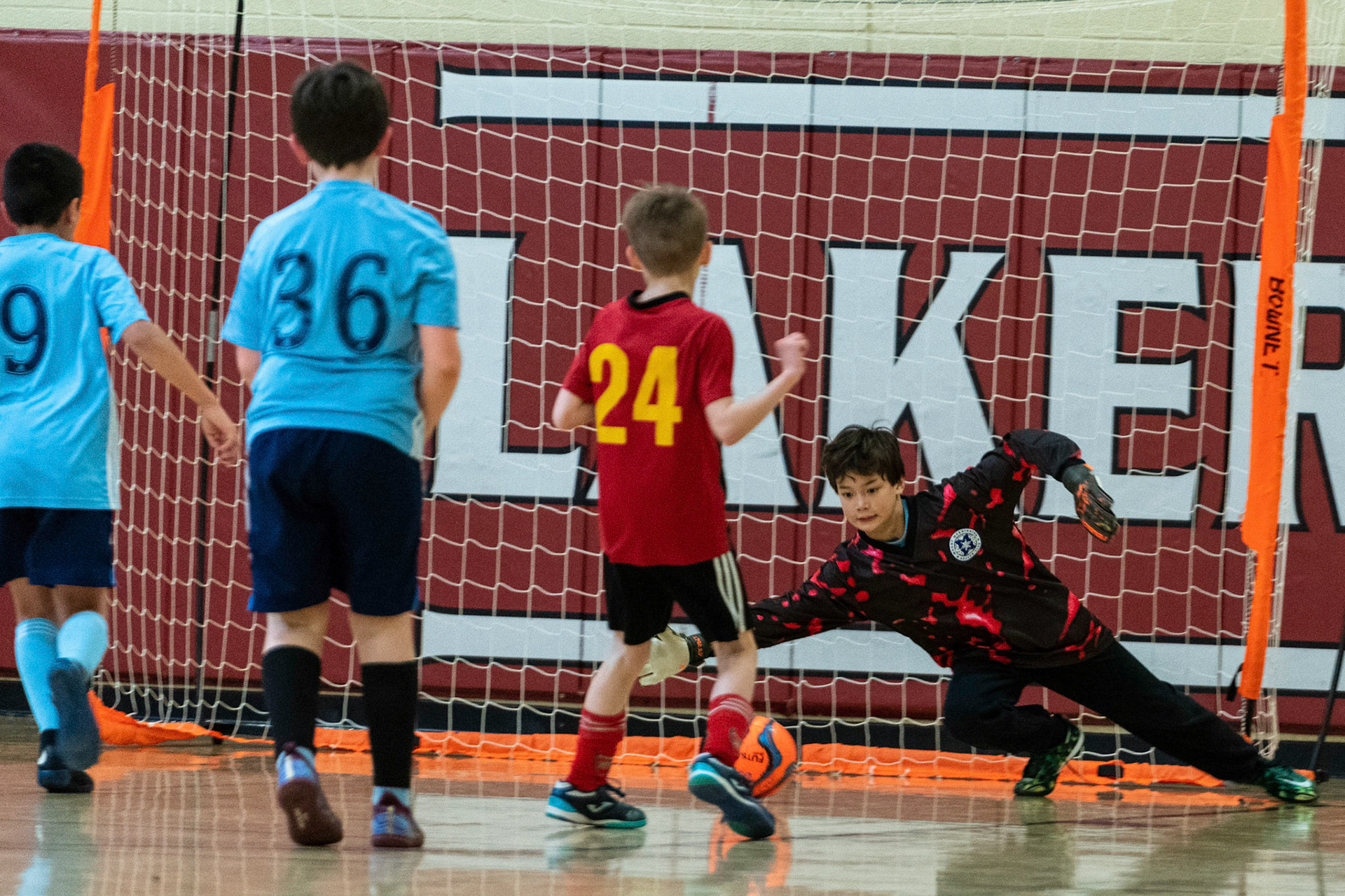 Luke makes another diving save as Mt Washington defeats Charles Village Black 11-3 on Saturday, February 18, 2023.