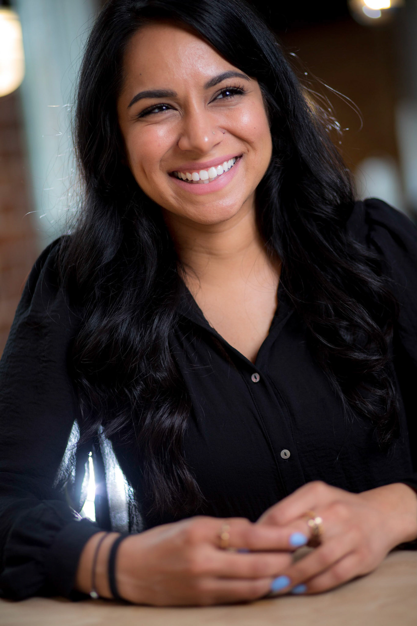 Portraits and headshots of Mikaela Seligman, CEO of AchieveMission.