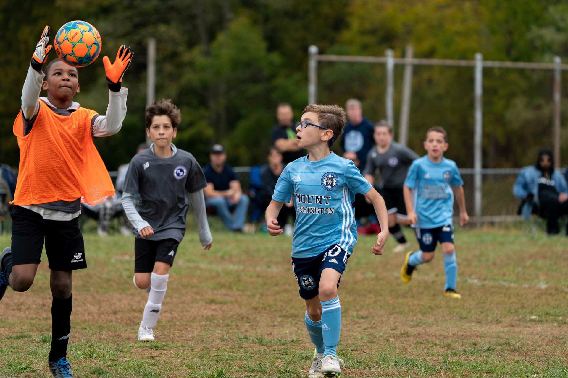 Jonah crashes the goal as Northwest SC's goalie makes a save in the first half of Mt Washington's 3-1 home victory over Northwest SC on October 23, 2022.