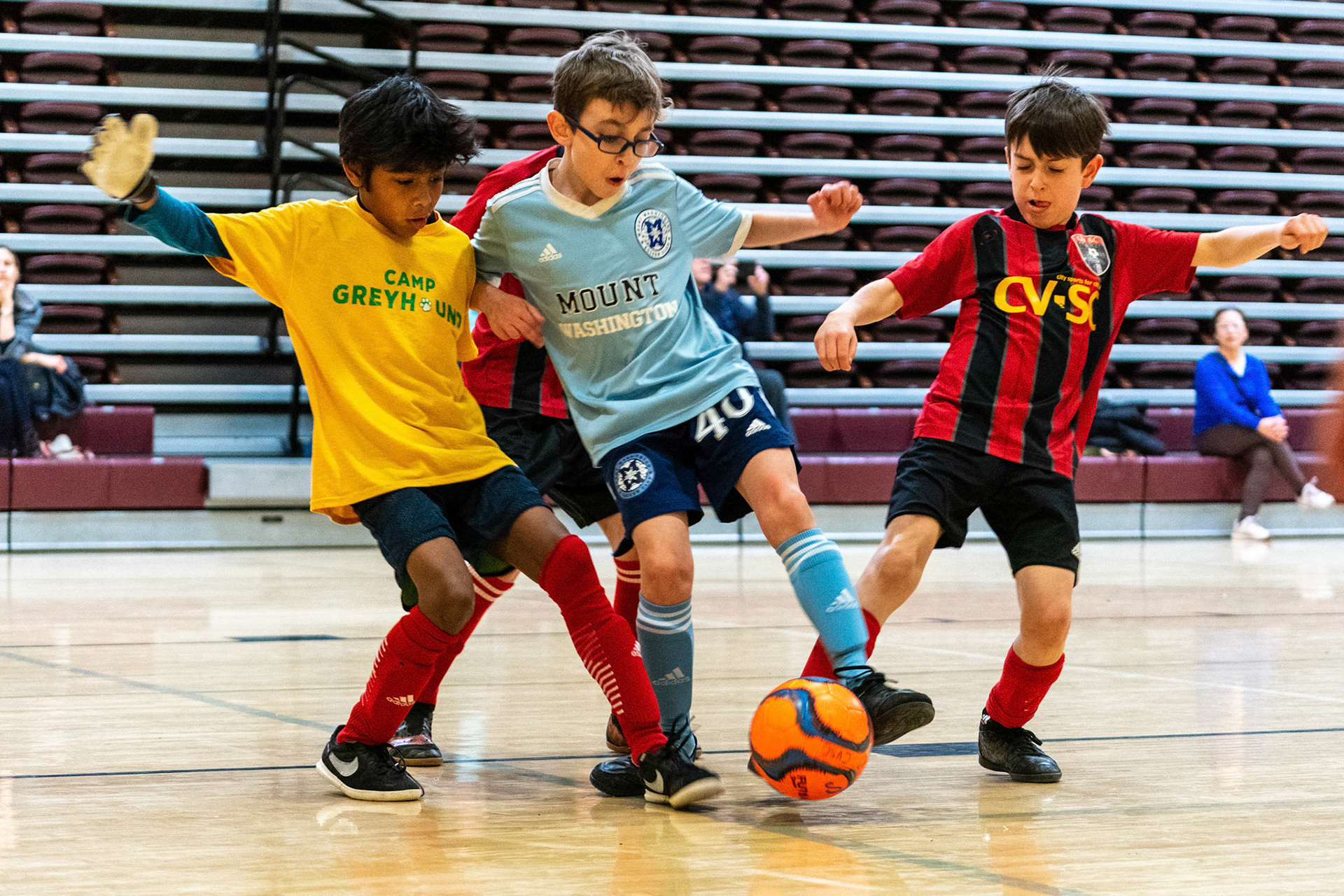 Jonah tries to work aroud the goalie as Mt Washington defeats Charles Village Black 11-3 on Saturday, February 18, 2023.