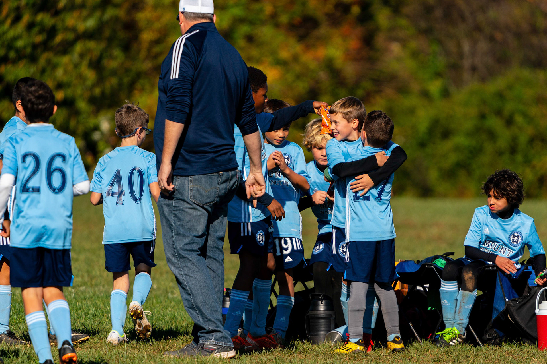 Nico and Simon celebrate Simon’s hat trick, and the team’s award of donuts, in the Mt. Washington Boy 12 travel team tournament 3-1 win over the Jefferson County Youth Soccer League on October 8, 2022.
