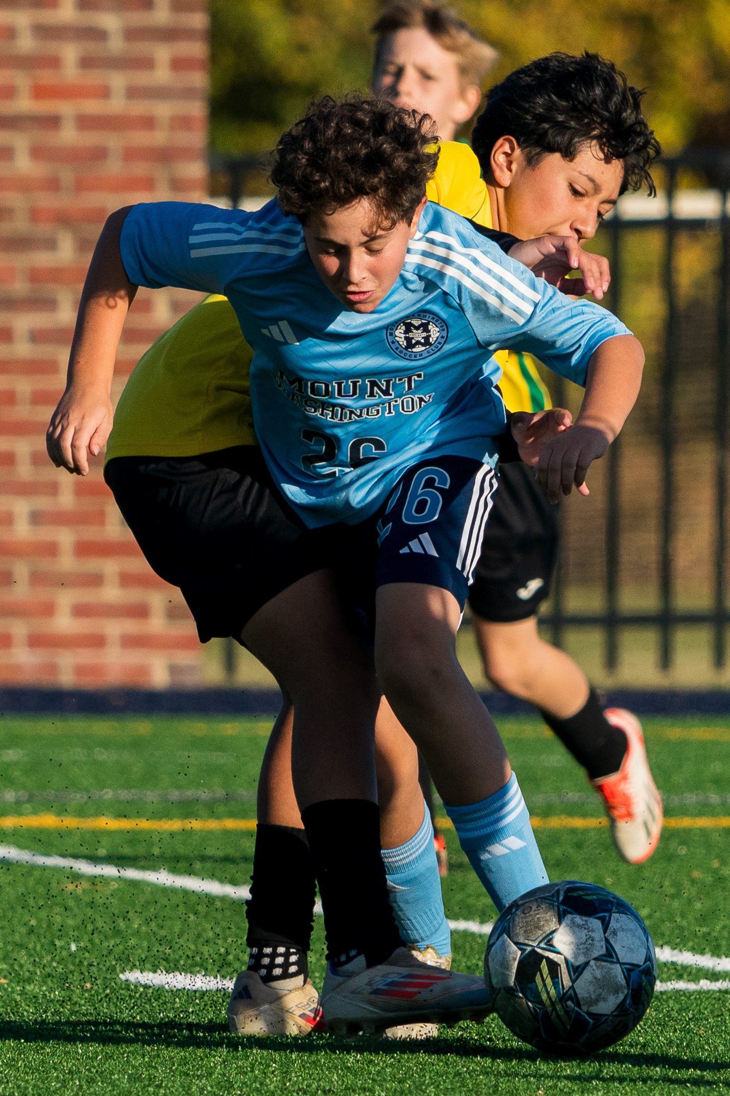 Did the defender go through Noah's leg to get the ball?