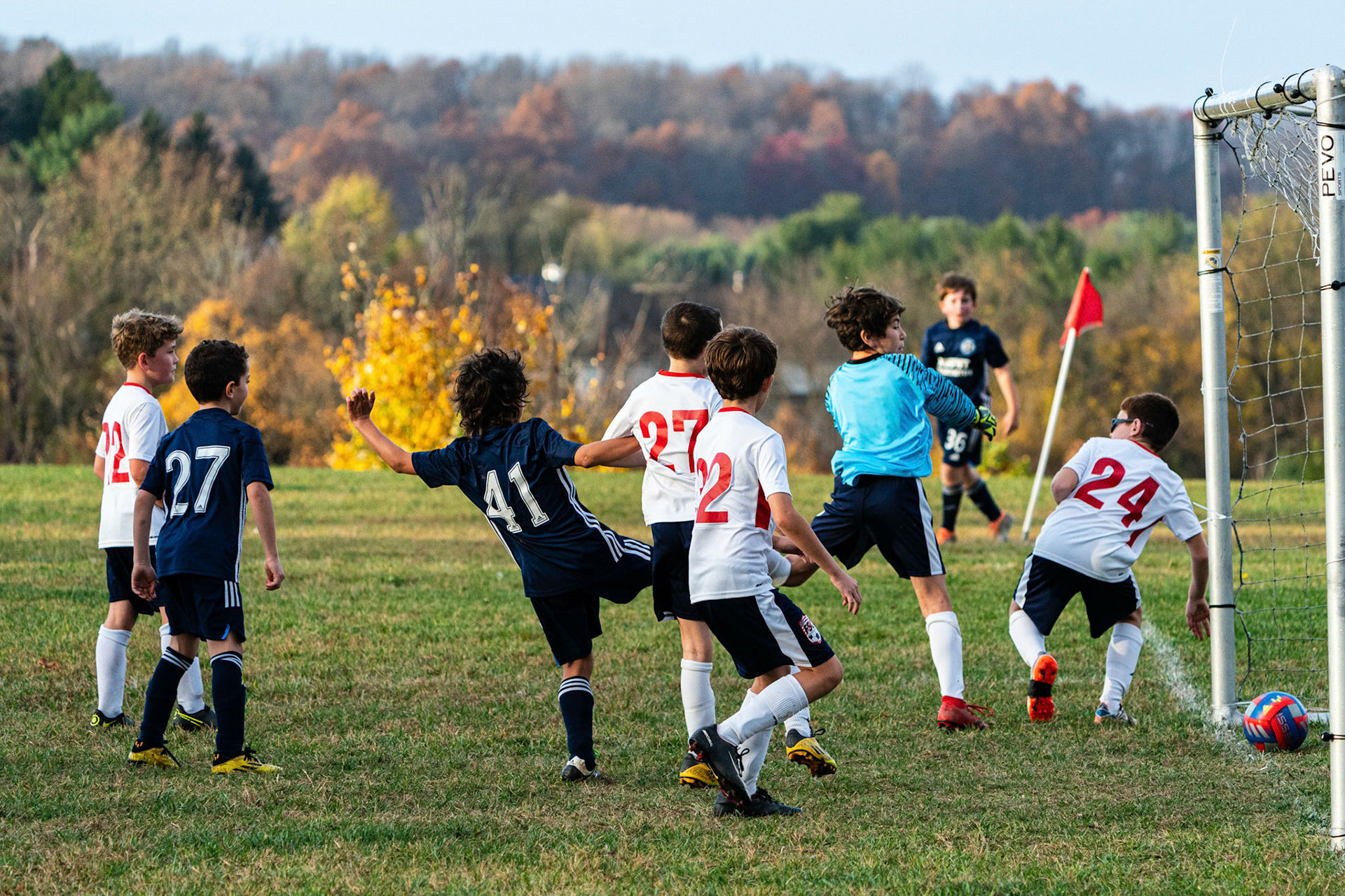 Graham continued his excellent corner kick service as his delivery is knocked into the goal by Freedom in the second half as Mt. Washington defeats Freedom SC 2-1 in their final game of fall 2022.