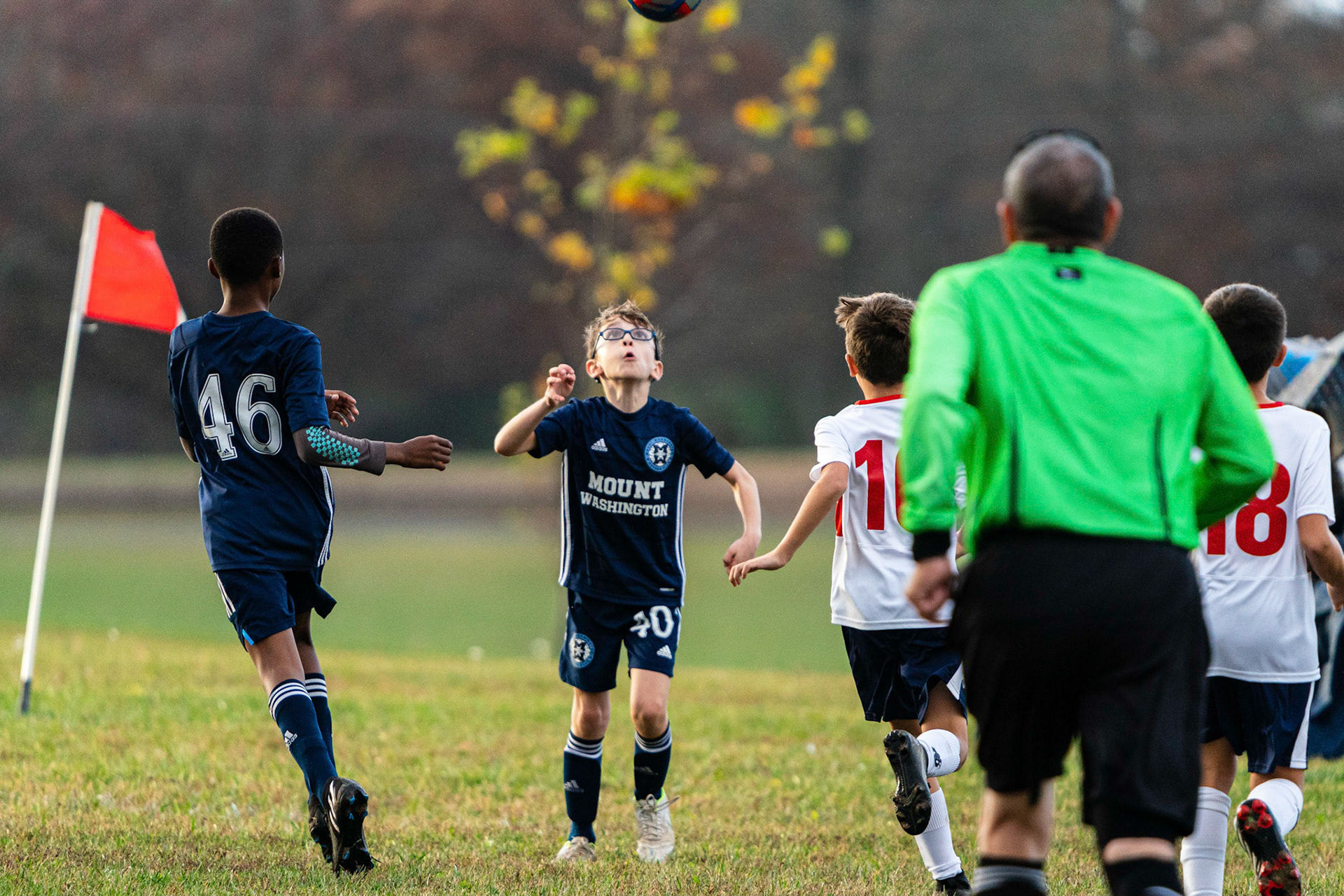 Jonah looks to bring the ball under control in the second half as Freedom players approach as Mt. Washington defeats Freedom SC 2-1 in their final game of fall 2022.