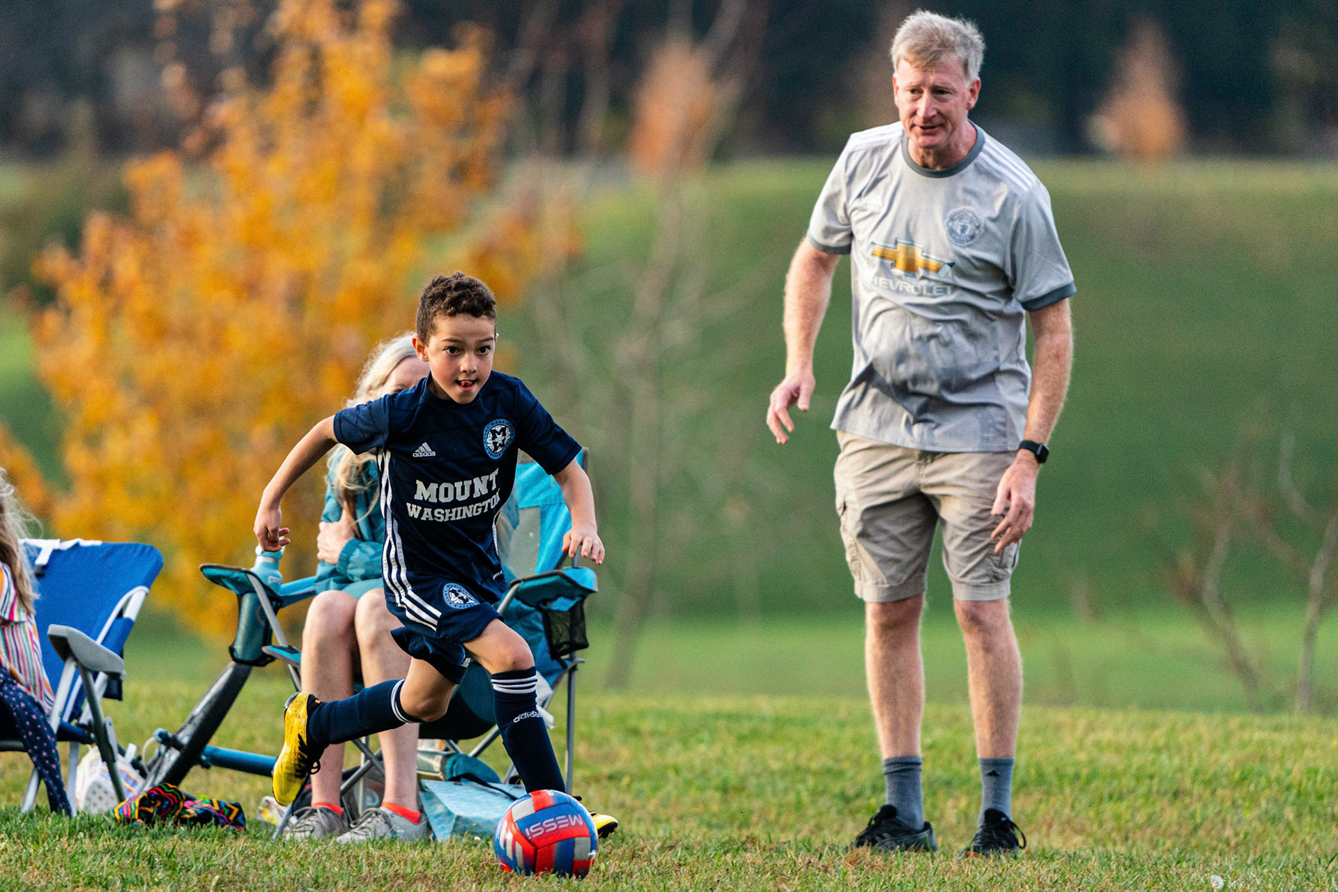 Coach John looks as if he about to take the field as Simon looks always for goal during Mt. Washington’s defeat of Freedom SC 2-1 in their final game of fall 2022.