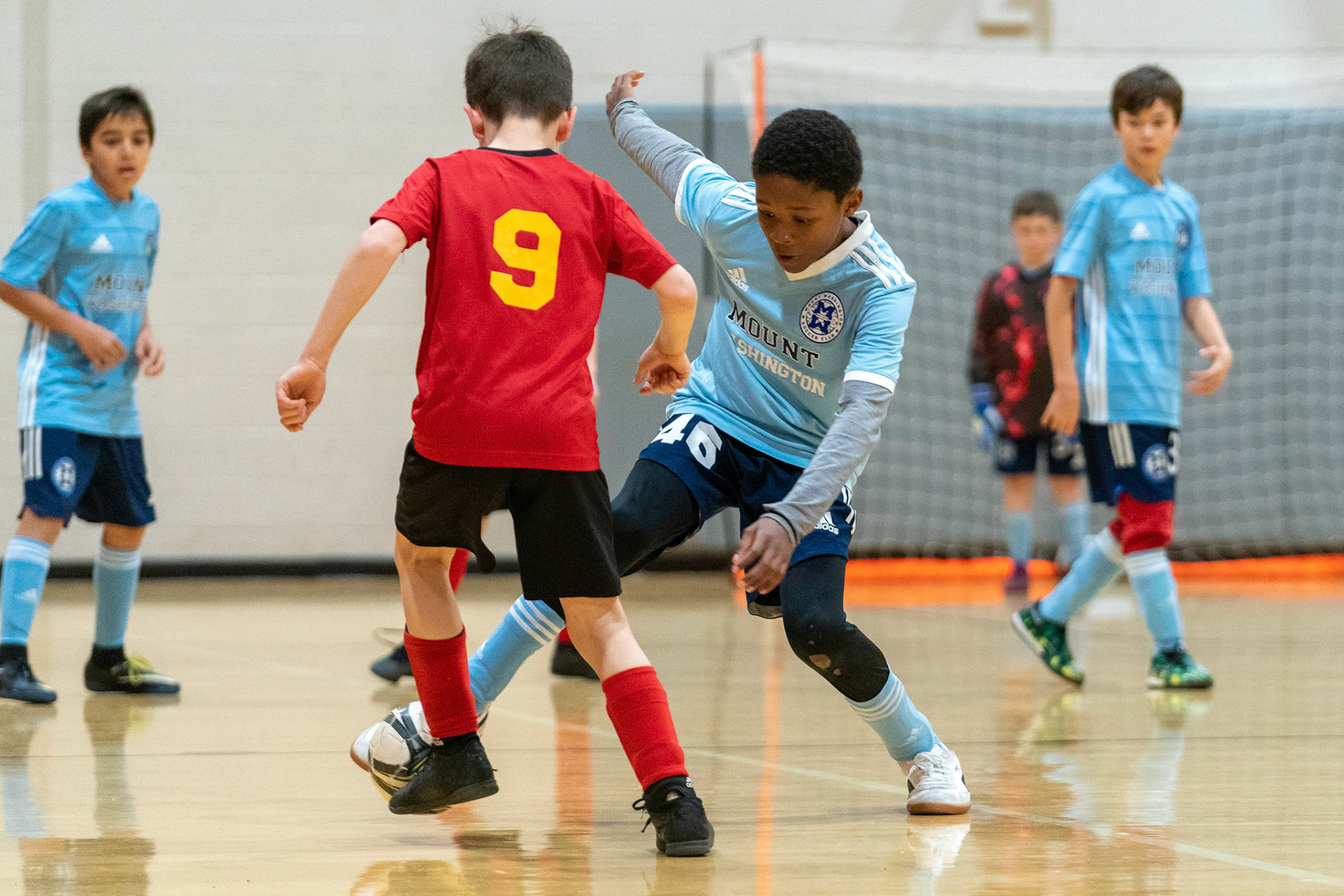 Treme defends at midcourt in the first half of the Mt. Washington Soccer 22/23 11-3 victory over  Charles Village.
