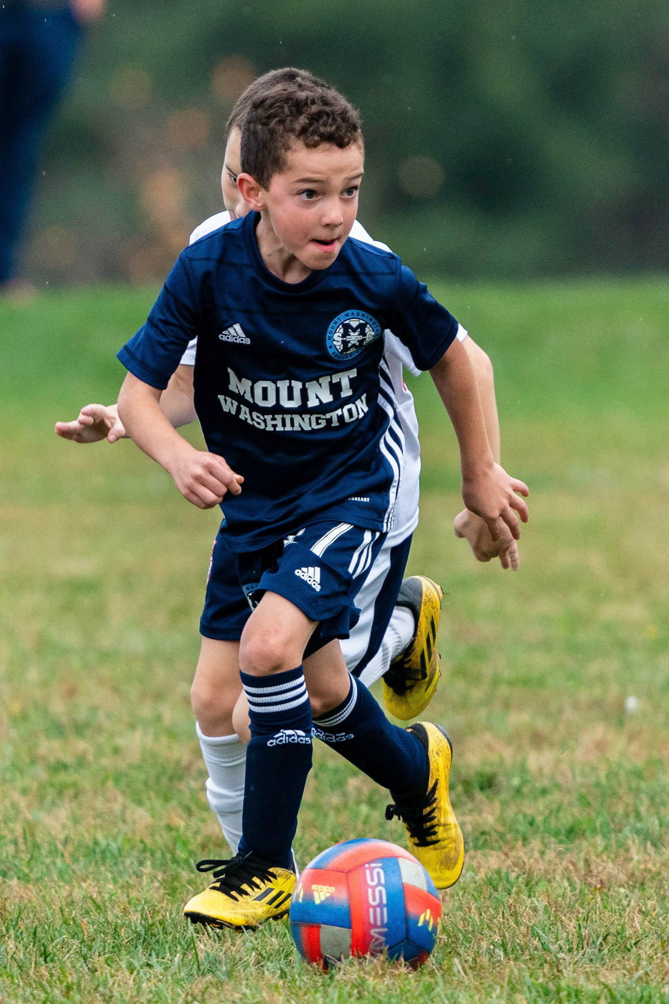 Simon looks for a pass as Mt. Washington defeats Freedom SC 2-1 in their final game of fall 2022.