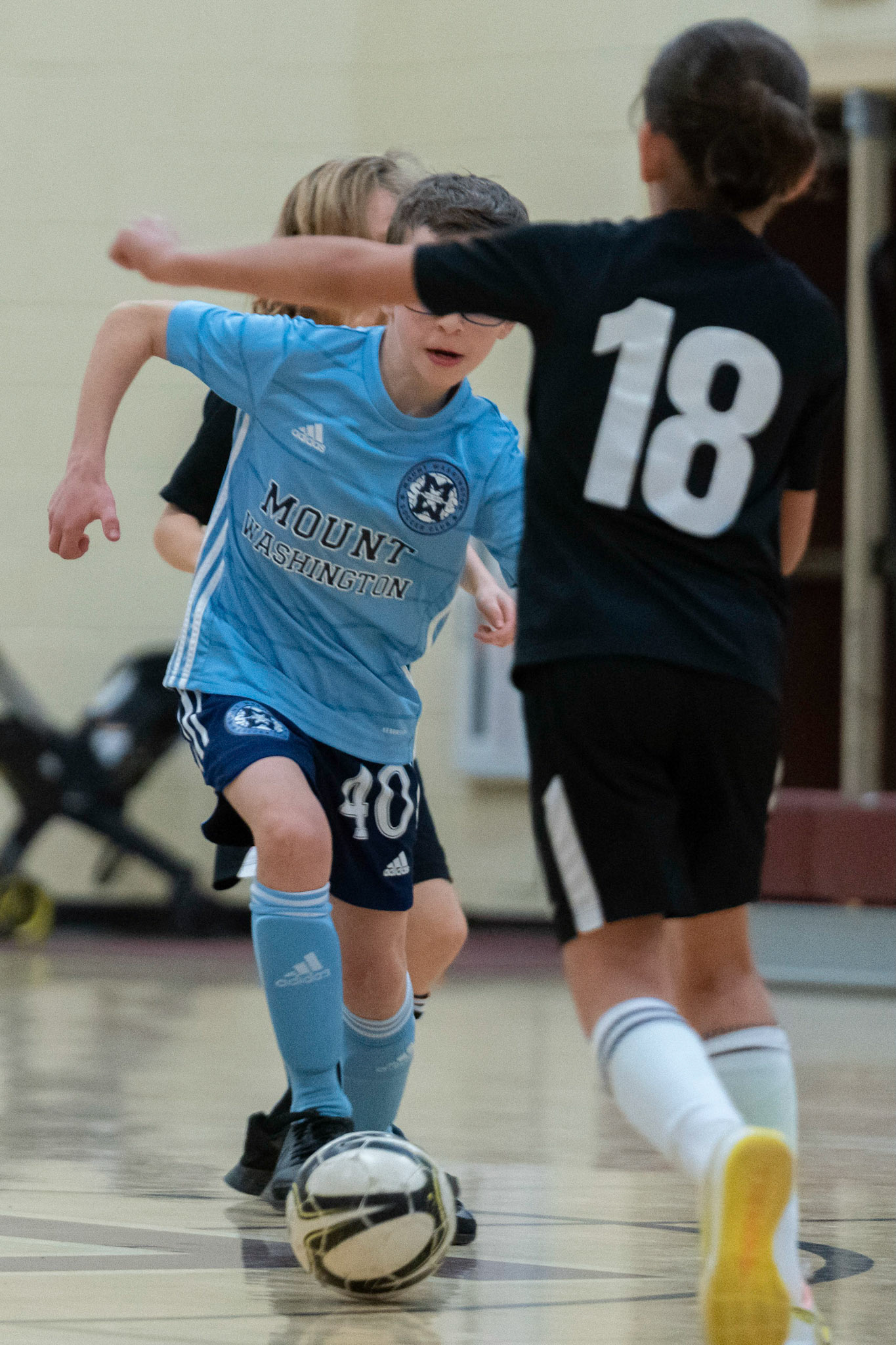 Jonah takes a defender on in the second half of the Mt. Washington Soccer 22/23 12-5 victory over  Towson United. Each player scored.