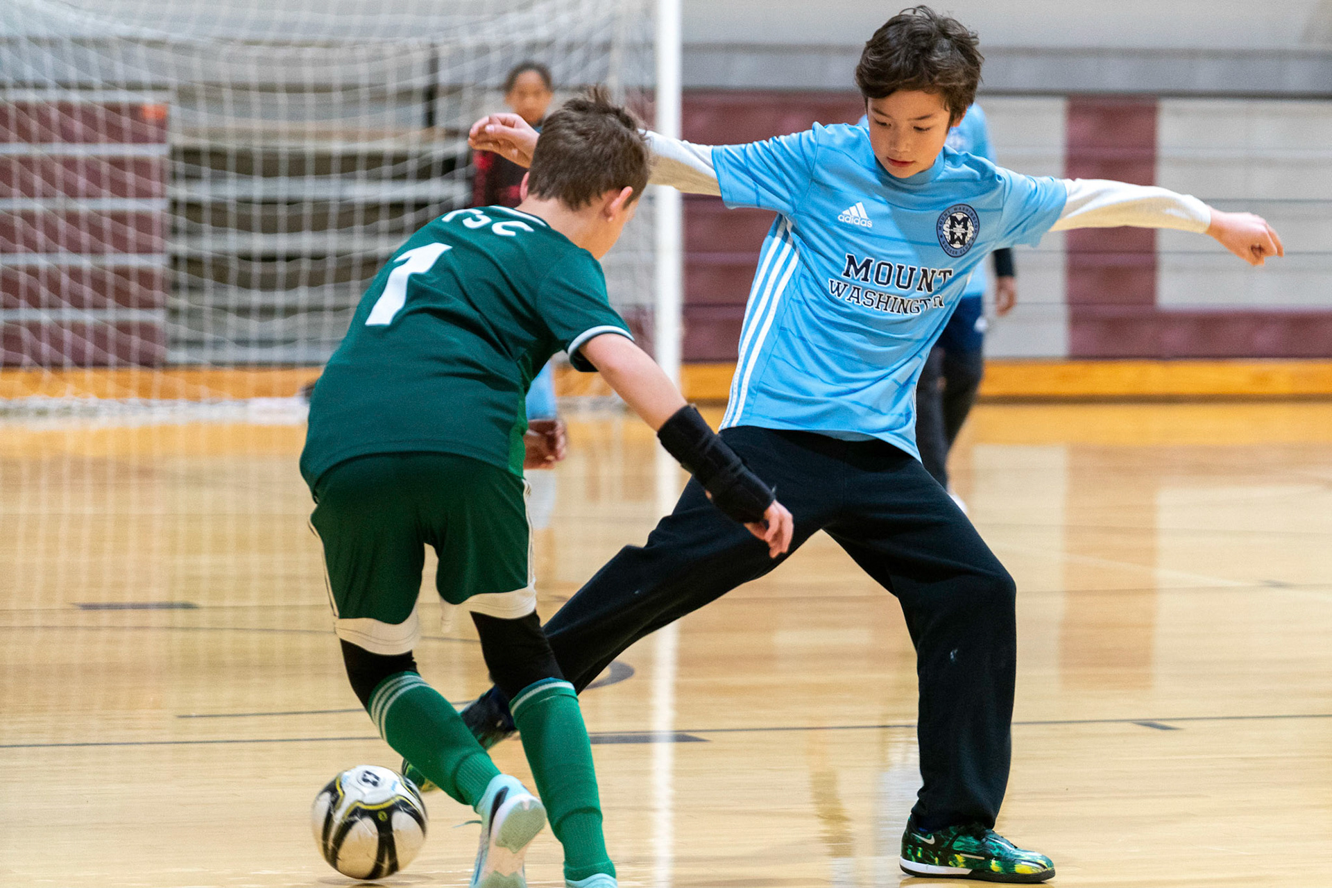 Luke keeps the ball away from the opponent as MWFC defeats LTSC 8-2 on Saturday, February 4, 2023.