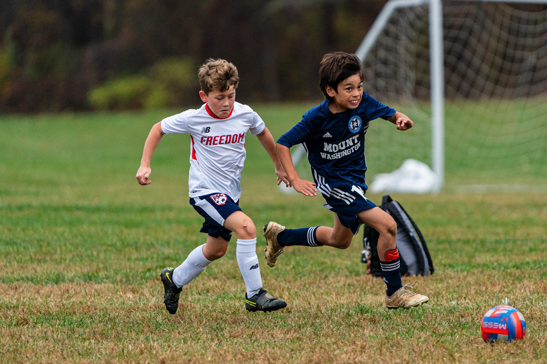 Gordon chases down the ball in midfield as Mt. Washington defeats Freedom SC 2-1 in their final game of fall 2022.