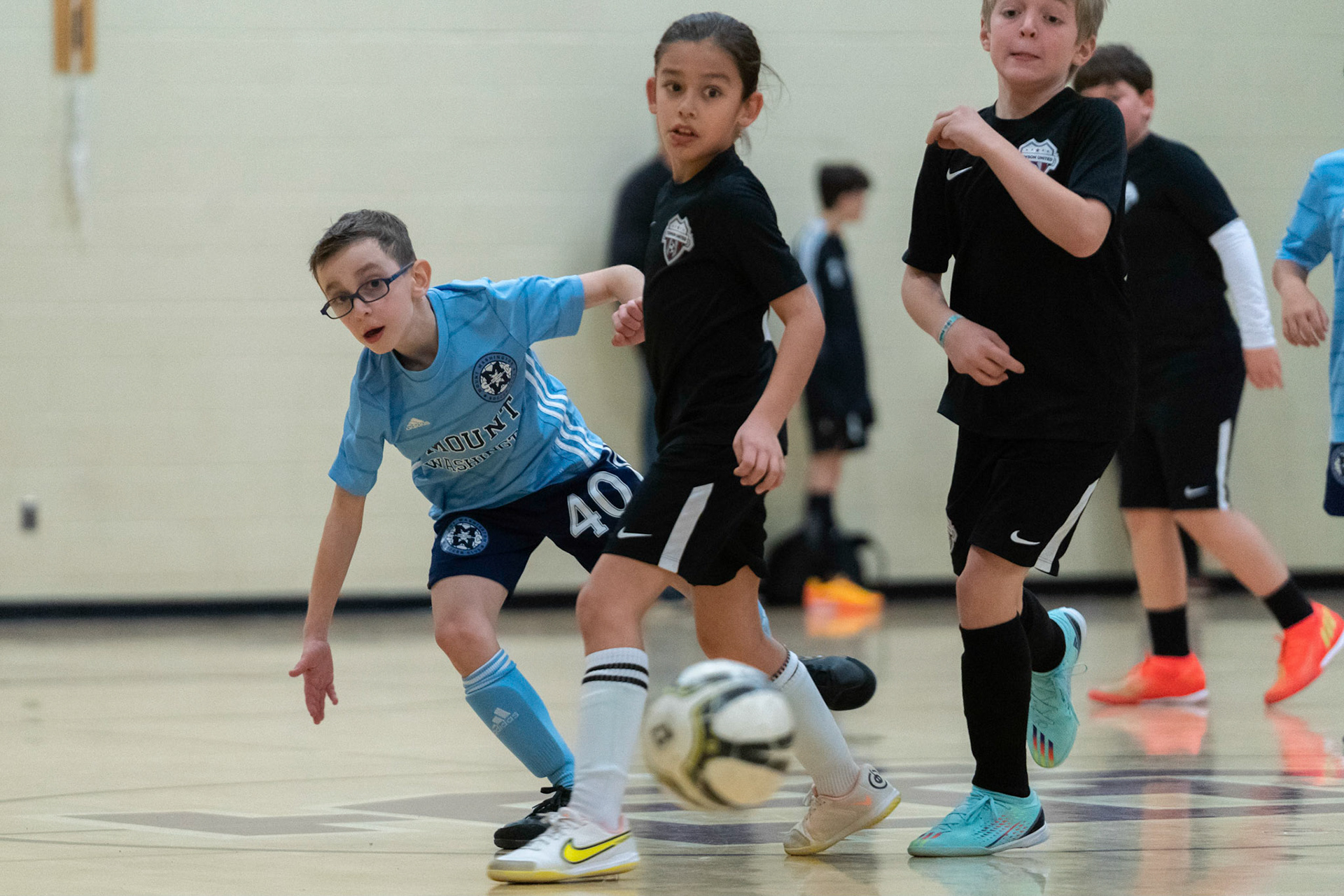 Jonah, and the defense, watch his shot head towards goal in the second half of the Mt. Washington Soccer 22/23 12-5 victory over  Towson United. Each player scored.