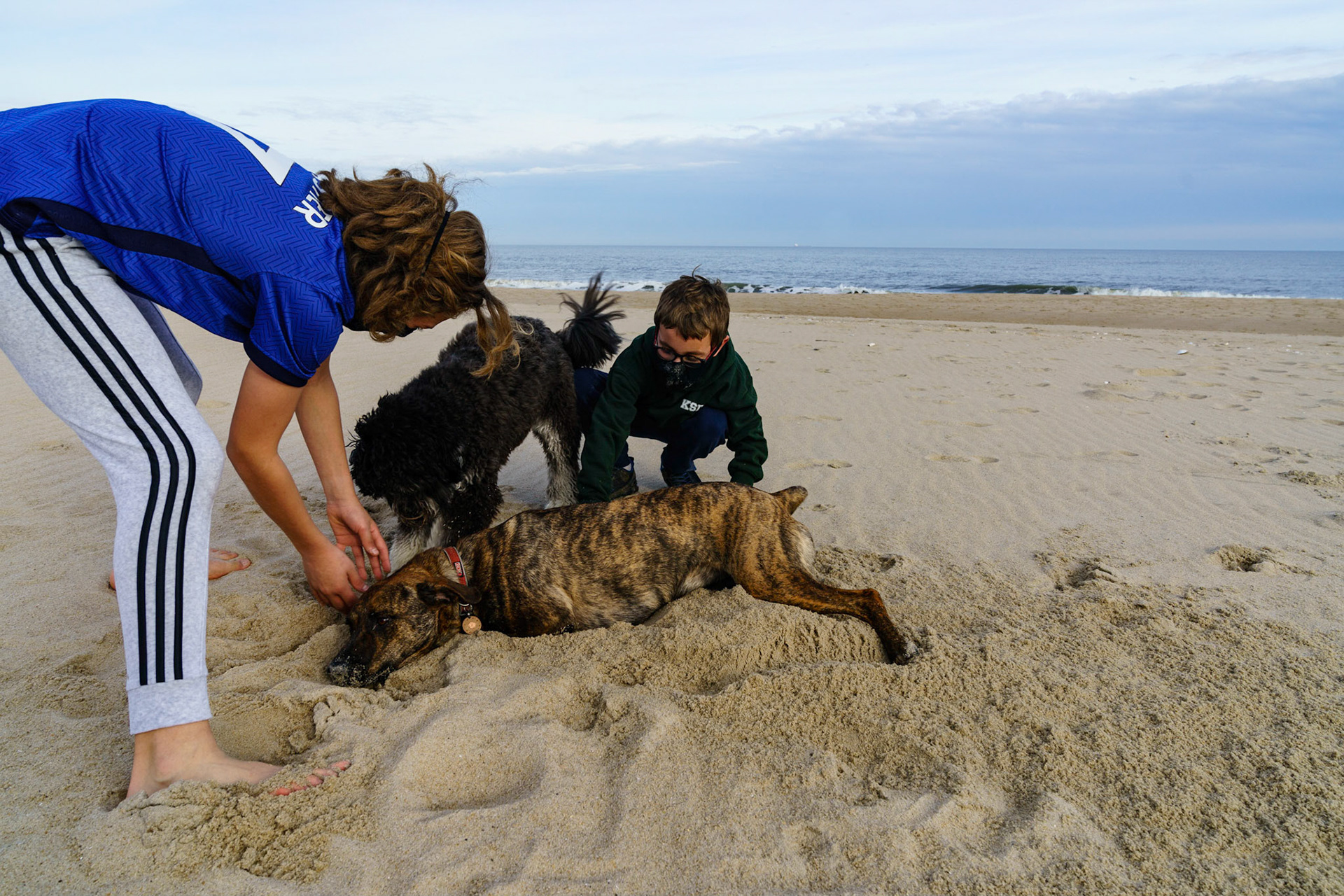 New Year’s trip to the beach. Hike at Gordon Pond in Cape Henlopen. Playing at the beach. Buried little ones.