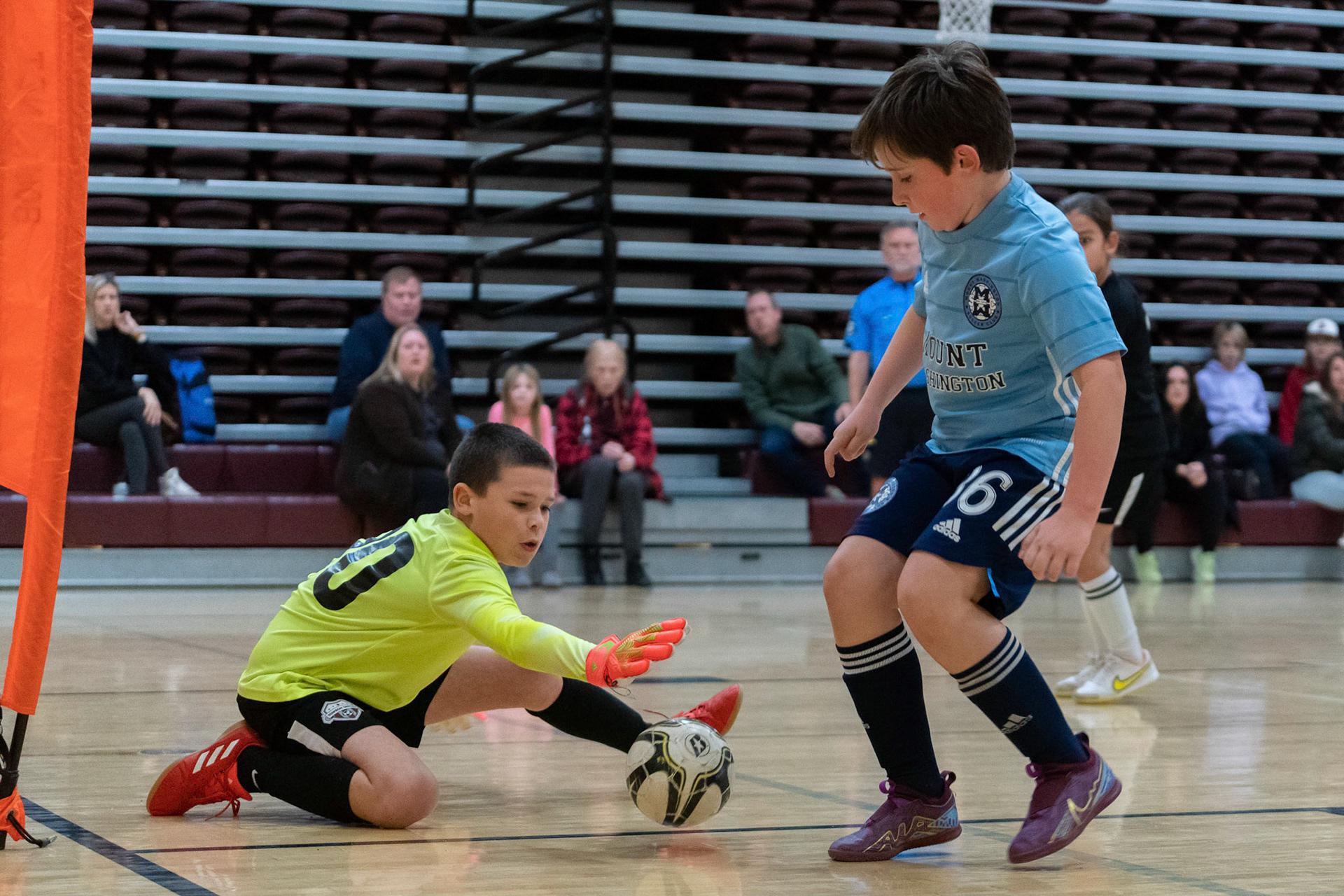 Graham presses the opposing goalie in the first half of the Mt. Washington Soccer 22/23 12-5 victory over  Towson United. Each player scored.