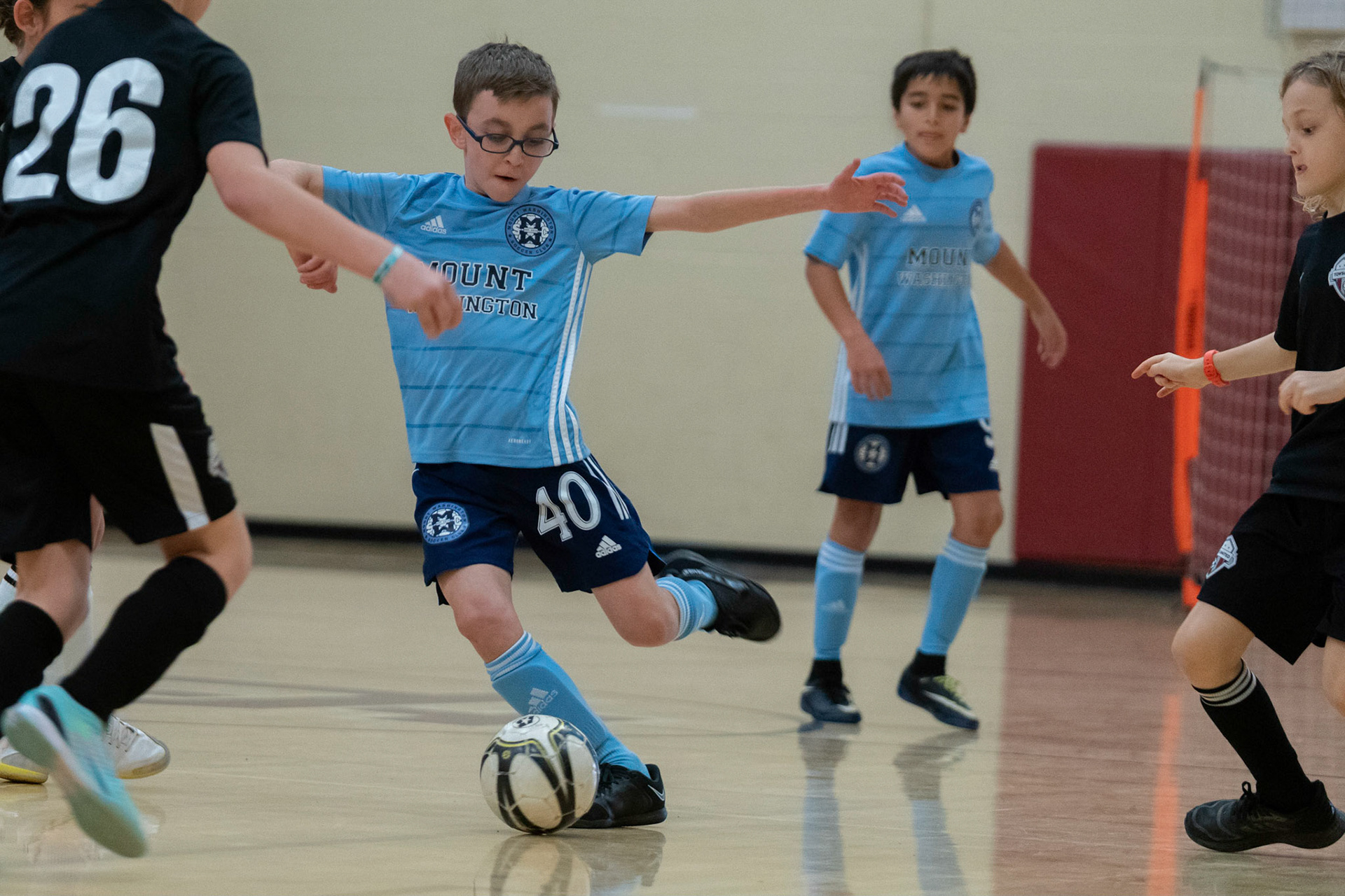 Jonah shoots in the first half of the Mt. Washington Soccer 22/23 12-5 victory over  Towson United. Each player scored.
