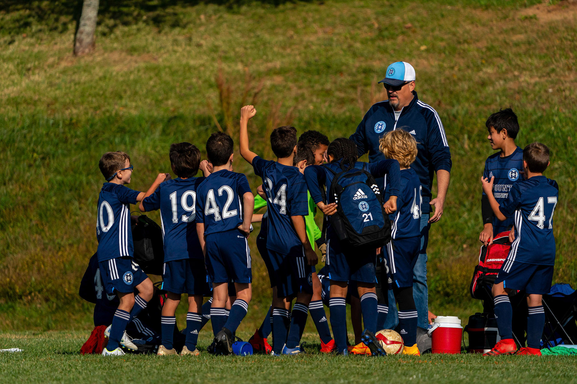 The team celebrates their Mt. Washington Boy 12 travel team’s 2-1 win over the Baltimore Bays on October 8, 2022.