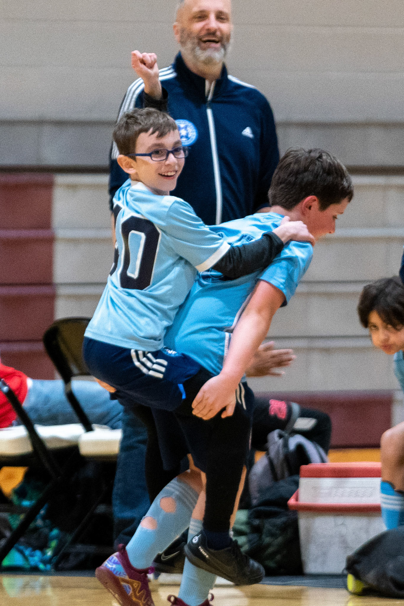 Jonah and Graham celebrate MWFC victory over LTSC 8-2 on Saturday, February 4, 2023.