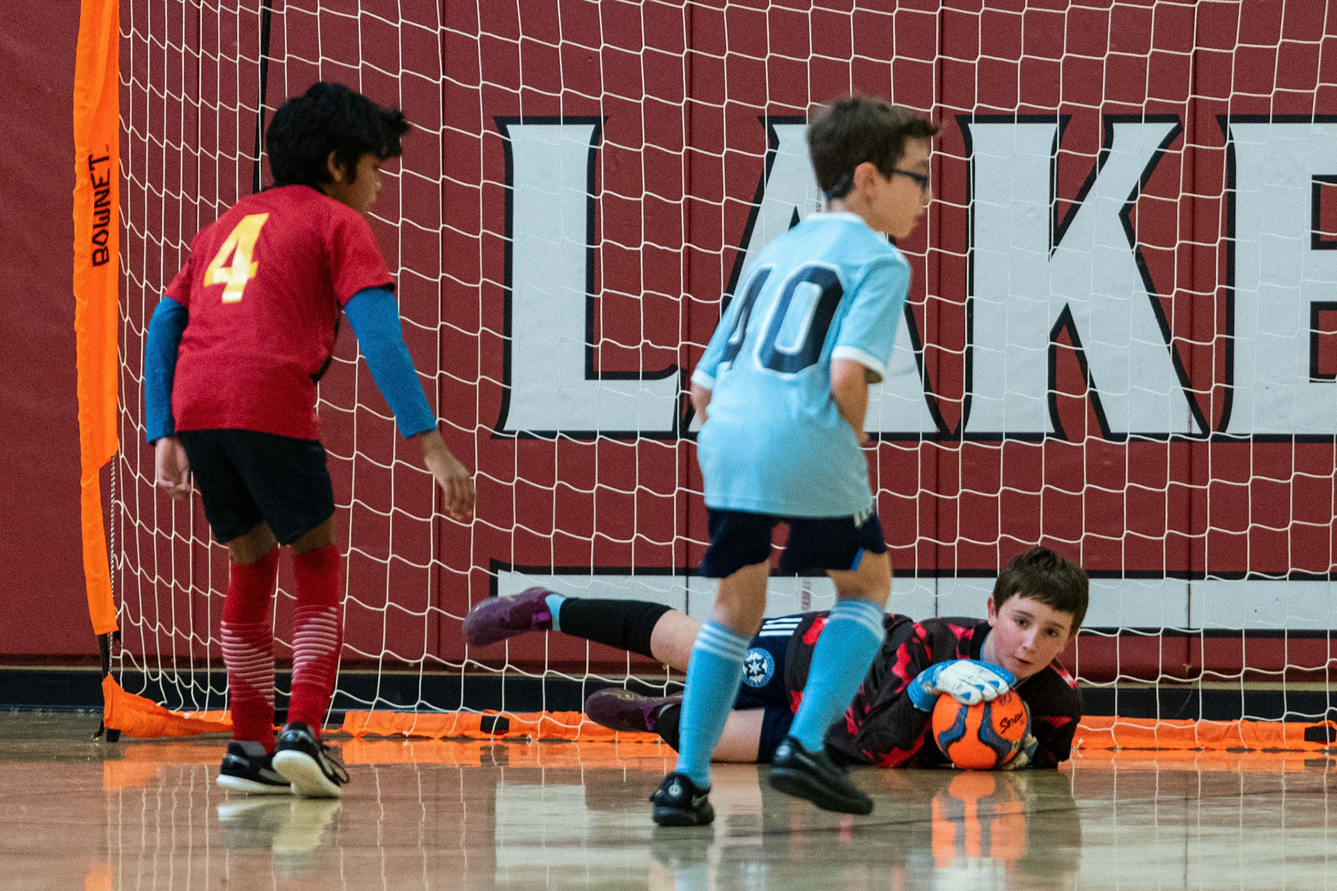 Graham saves a shot in the second half as Mt Washington defeats Charles Village Black 11-3 on Saturday, February 18, 2023.