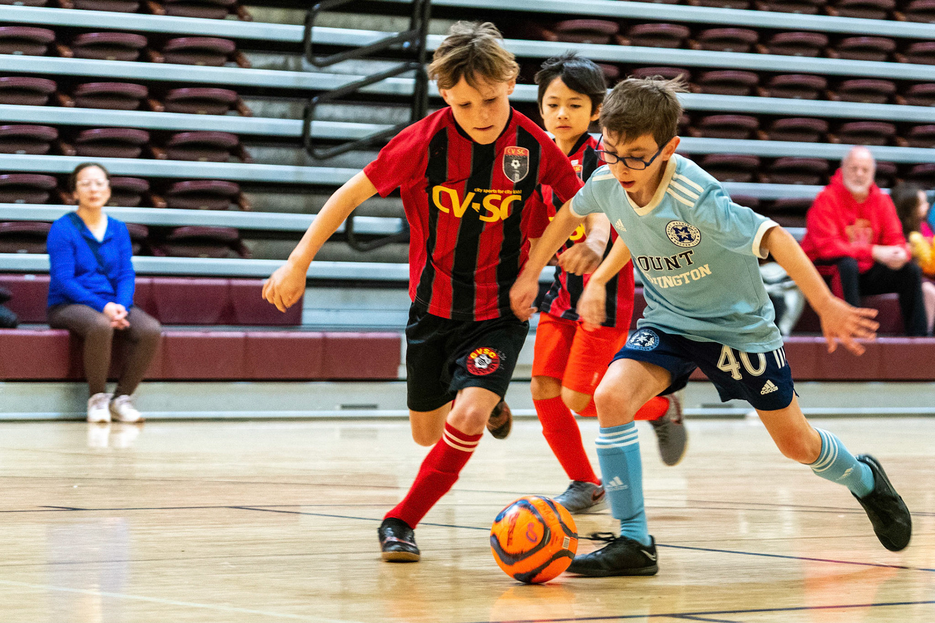 Jonah tries to keep the ball away as Mt Washington defeats Charles Village Black 11-3 on Saturday, February 18, 2023.