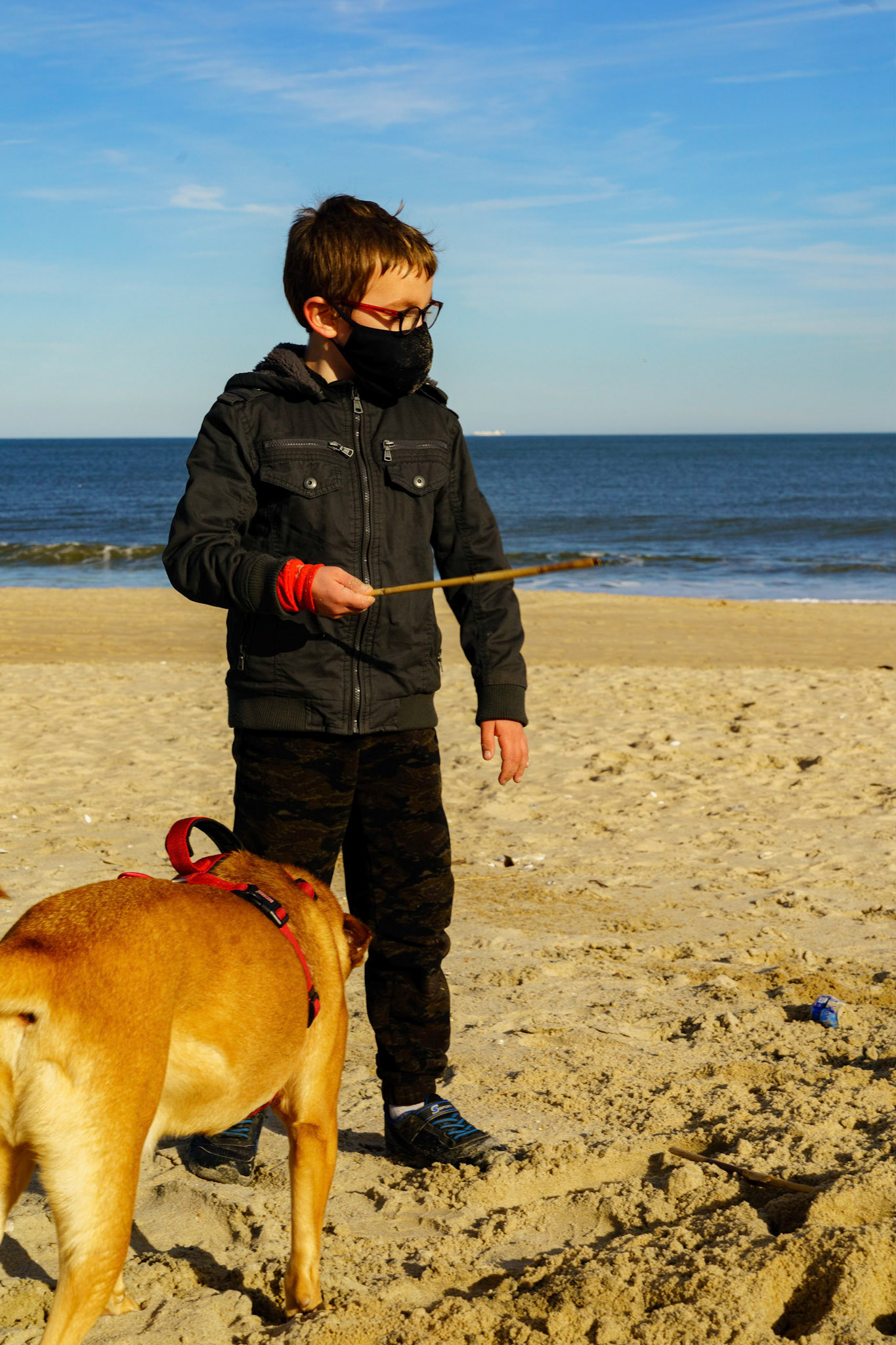 New Year’s trip to the beach. Playing at the beach. Buried little ones.