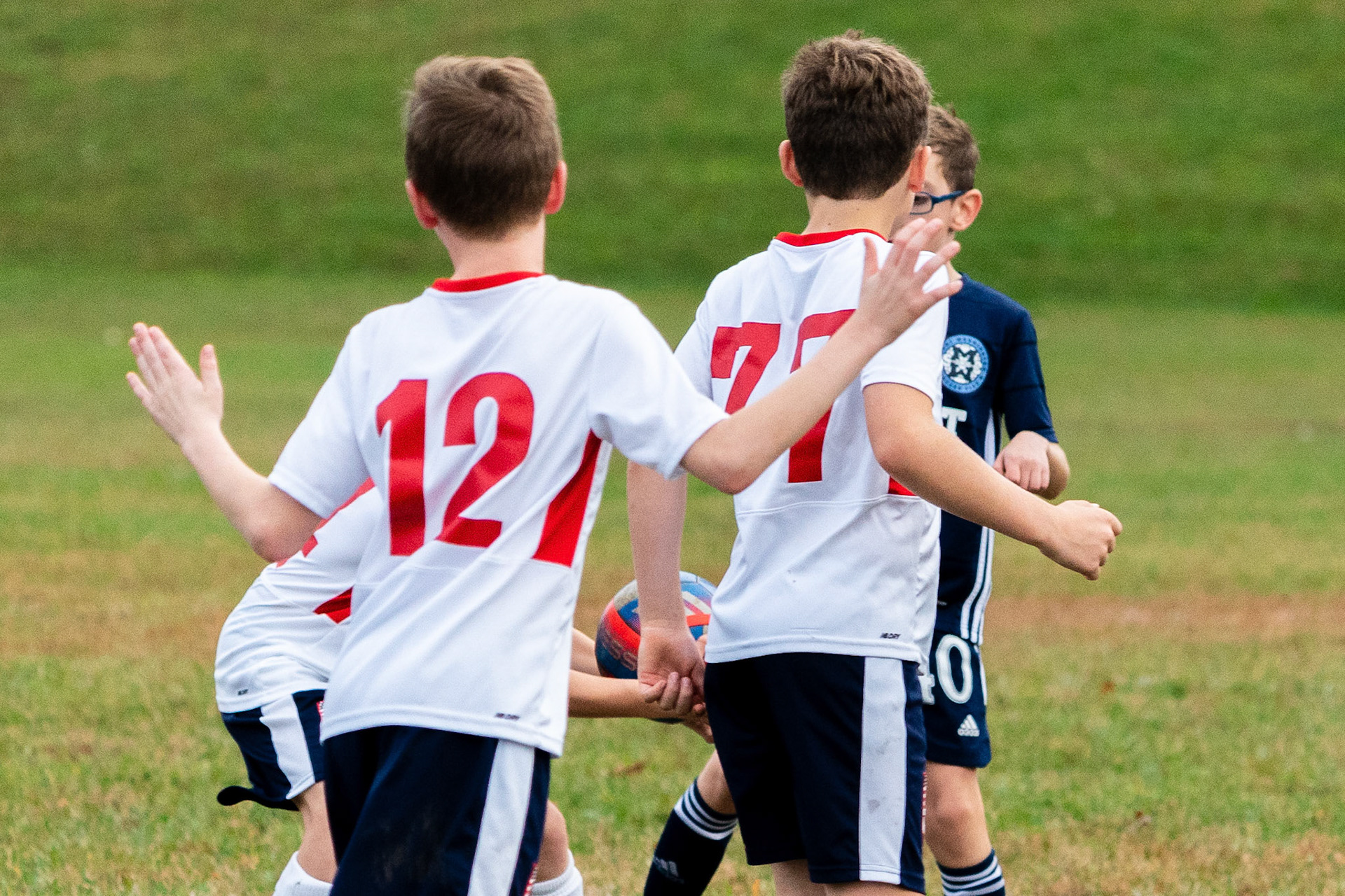 Graham’s corner kick bounces off of the post towards the spot where a Freedom defender handles the ball earning a penalty kick in the first half as Mt. Washington defeats Freedom SC 2-1 in their final game of fall 2022.