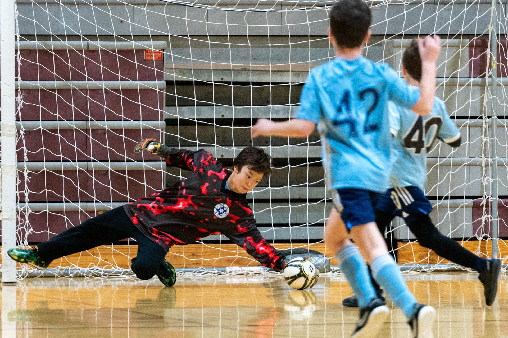 Luke makes a diving save as MWFC defeats LTSC 8-2 on Saturday, February 4, 2023.