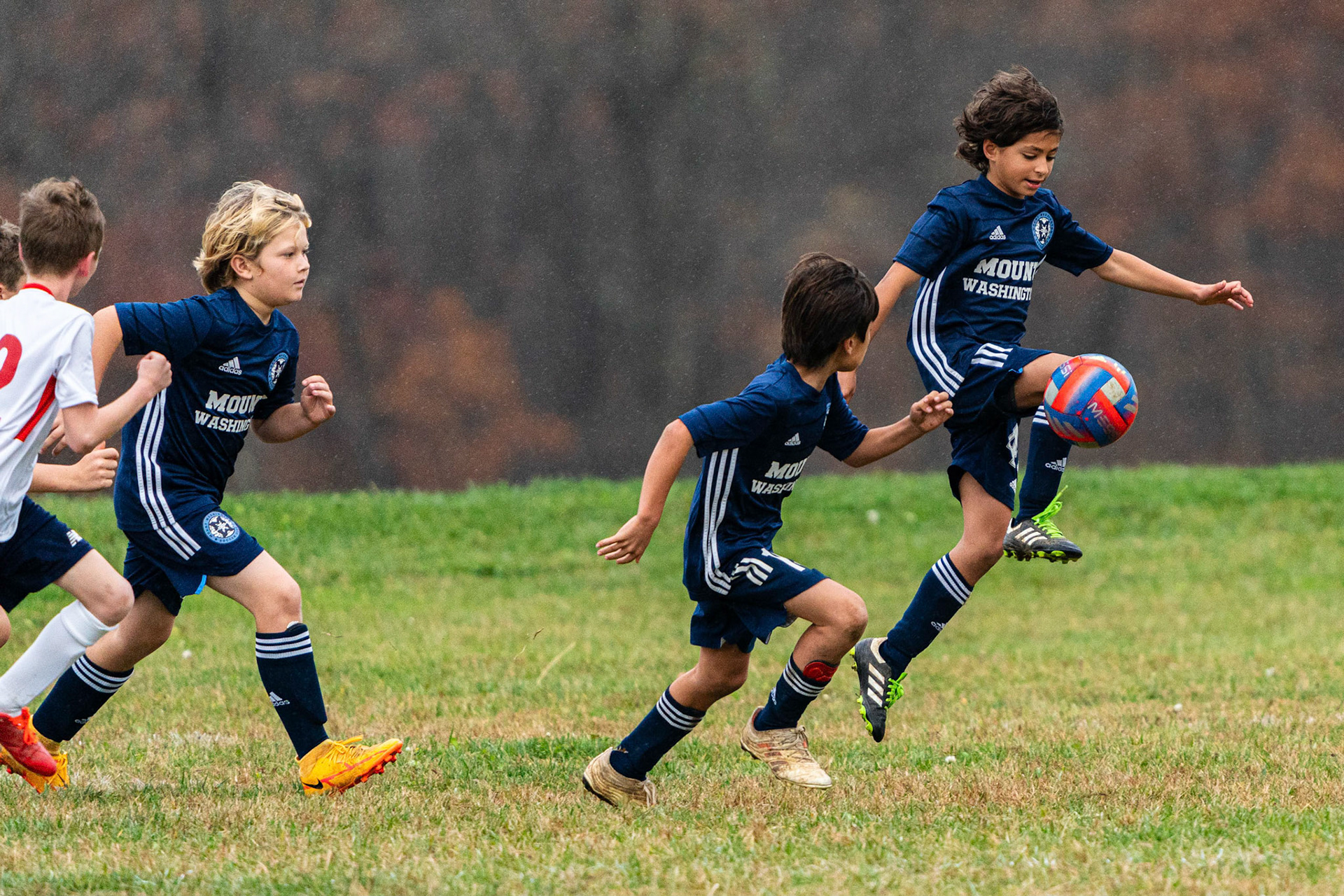 Anderson brings the ball under control as Gordon and Reed  look to be an outlet as Mt. Washington defeats Freedom SC 2-1 in their final game of fall 2022.