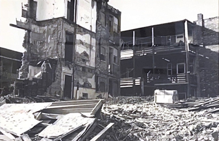 Black and white photograph of building ruins.