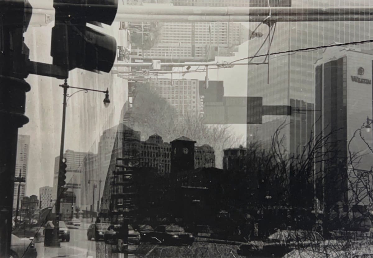 Overlaid black and white photographs of the city of Chicago