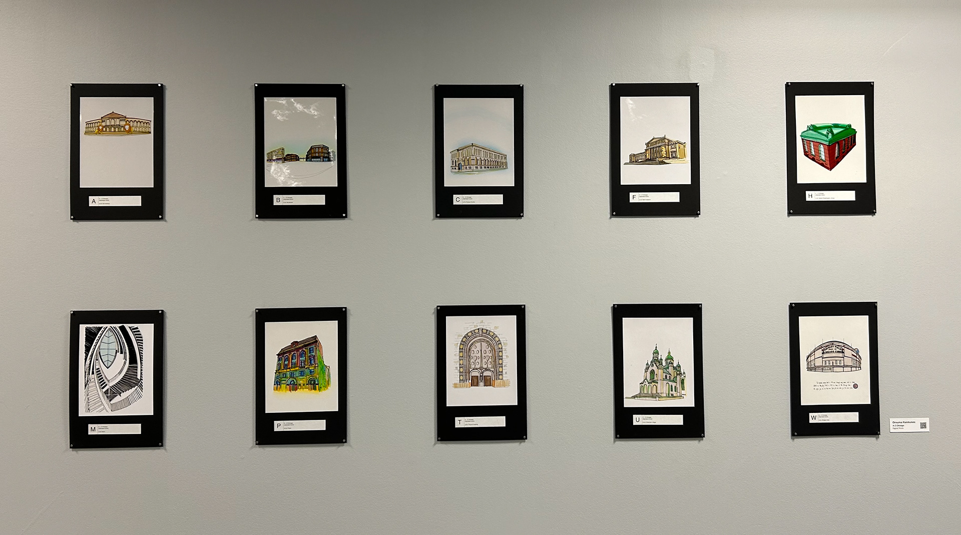 Ten digital prints on black mat board installed on a gallery wall. There are two rows of five print forming a grid. Each print has a different architectural monument from the city of Chicago.