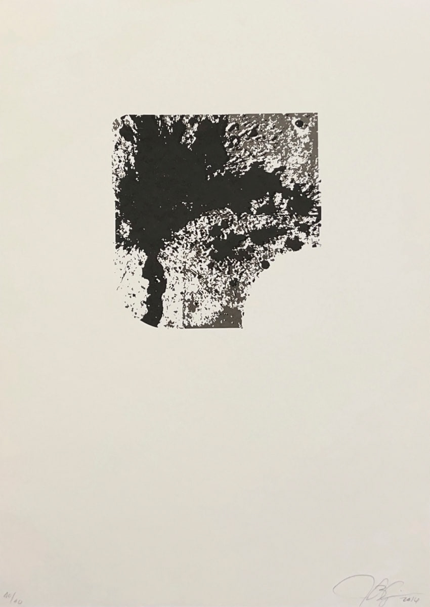 Square with a corner missing, made with blotted black ink, positioned slightly above the center of the image.