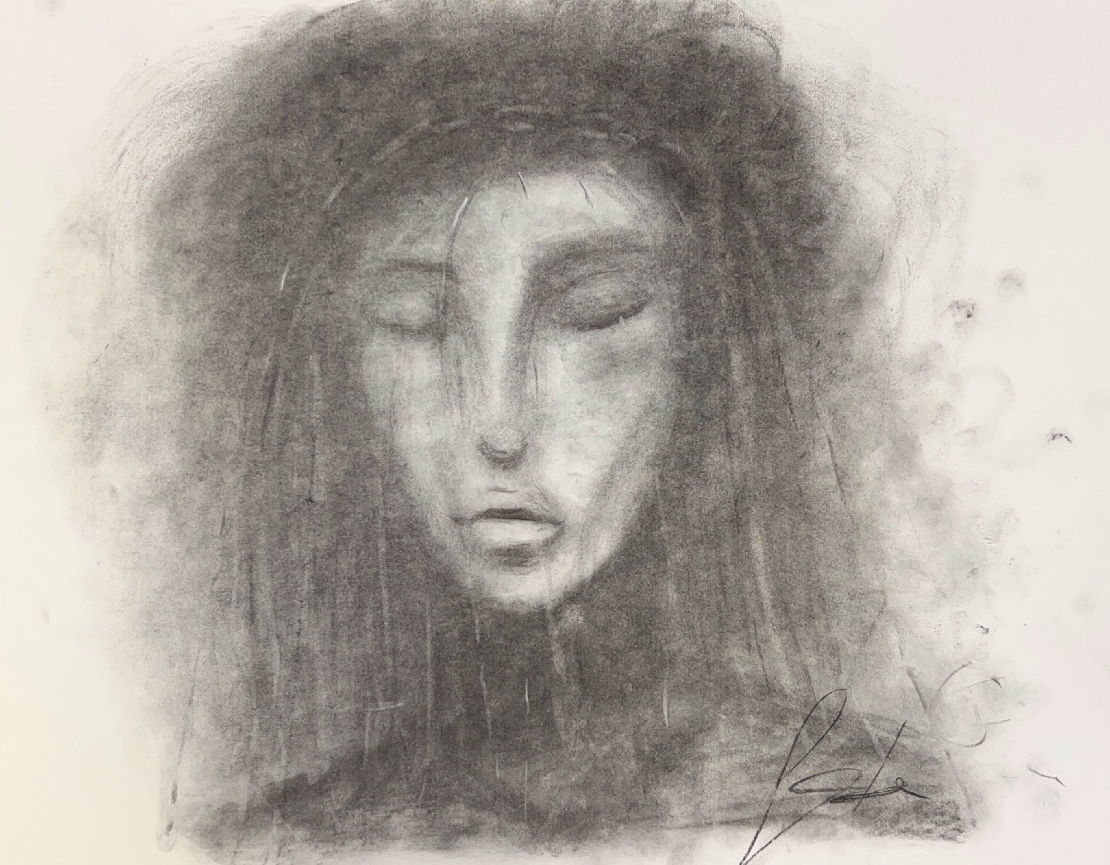 Black and white portrait of a woman with closed eyes.