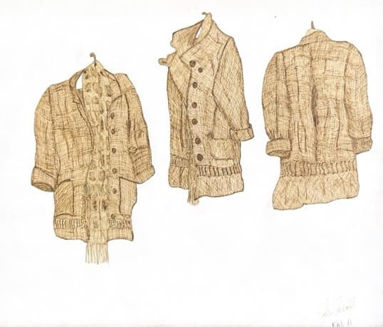 Three beige jackets suspended in a row over a white background.