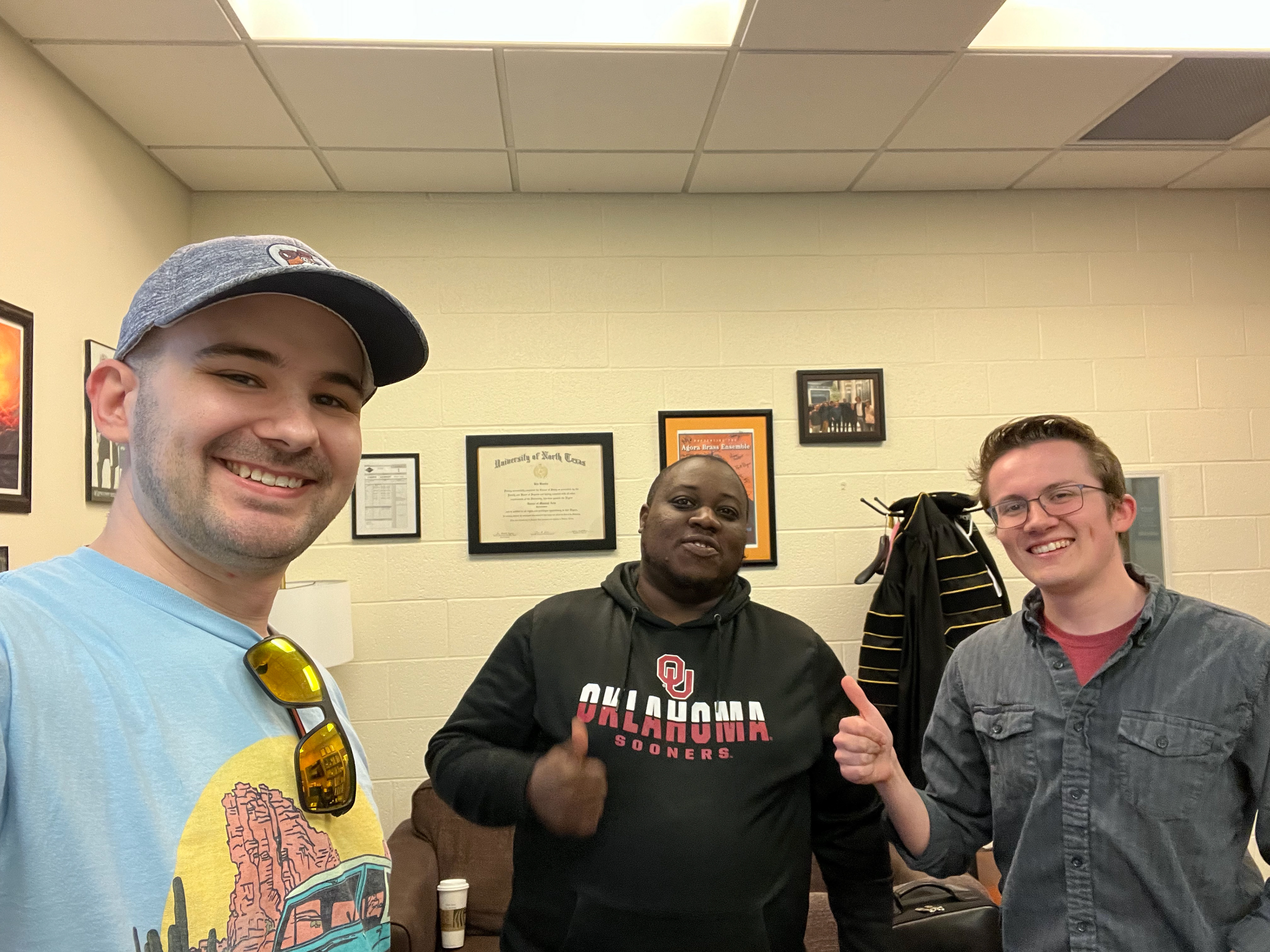 Director, Editor, and Composer wrap on a music meeting.