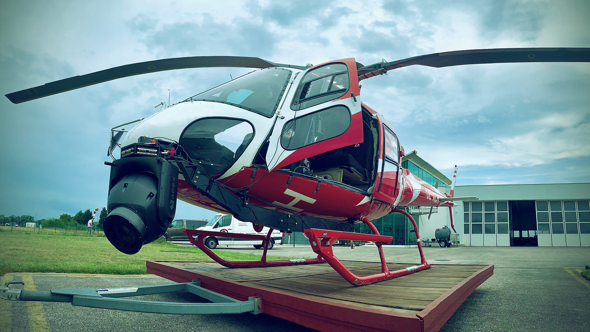 The AX18 stabilized camera gimbal on a AS350 Helicopter
