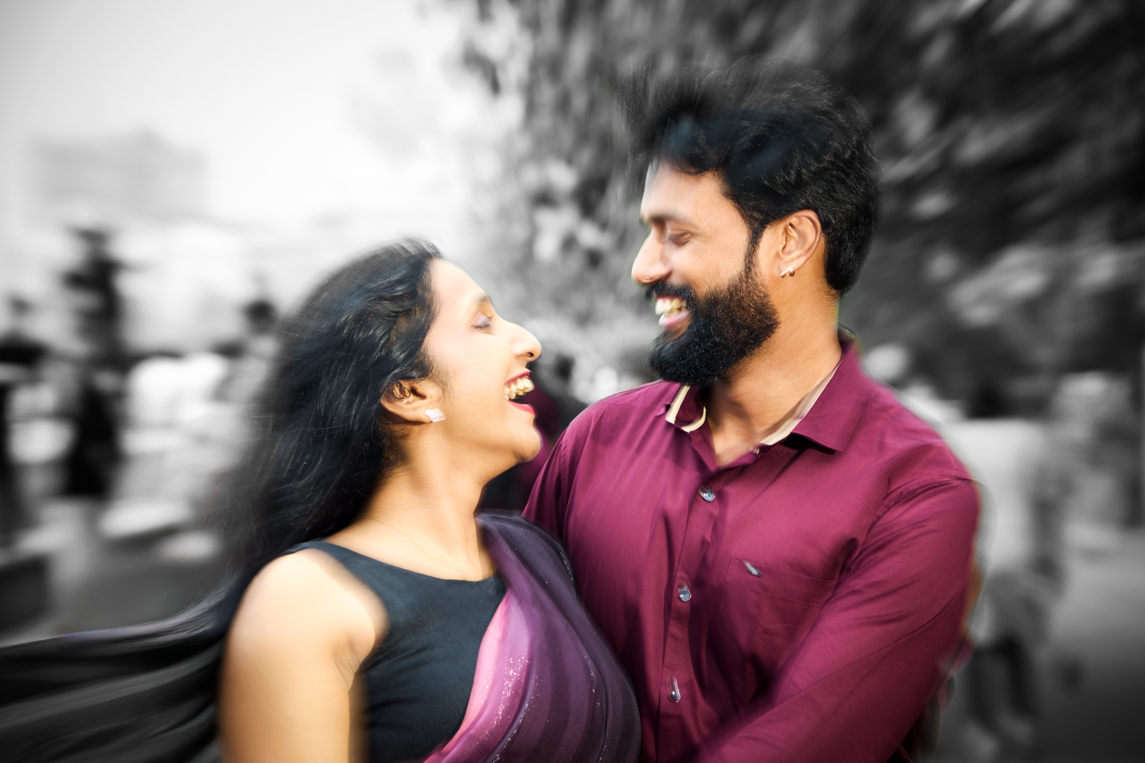 Artistic pre-wedding photography with dramatic lighting and cinematic styling