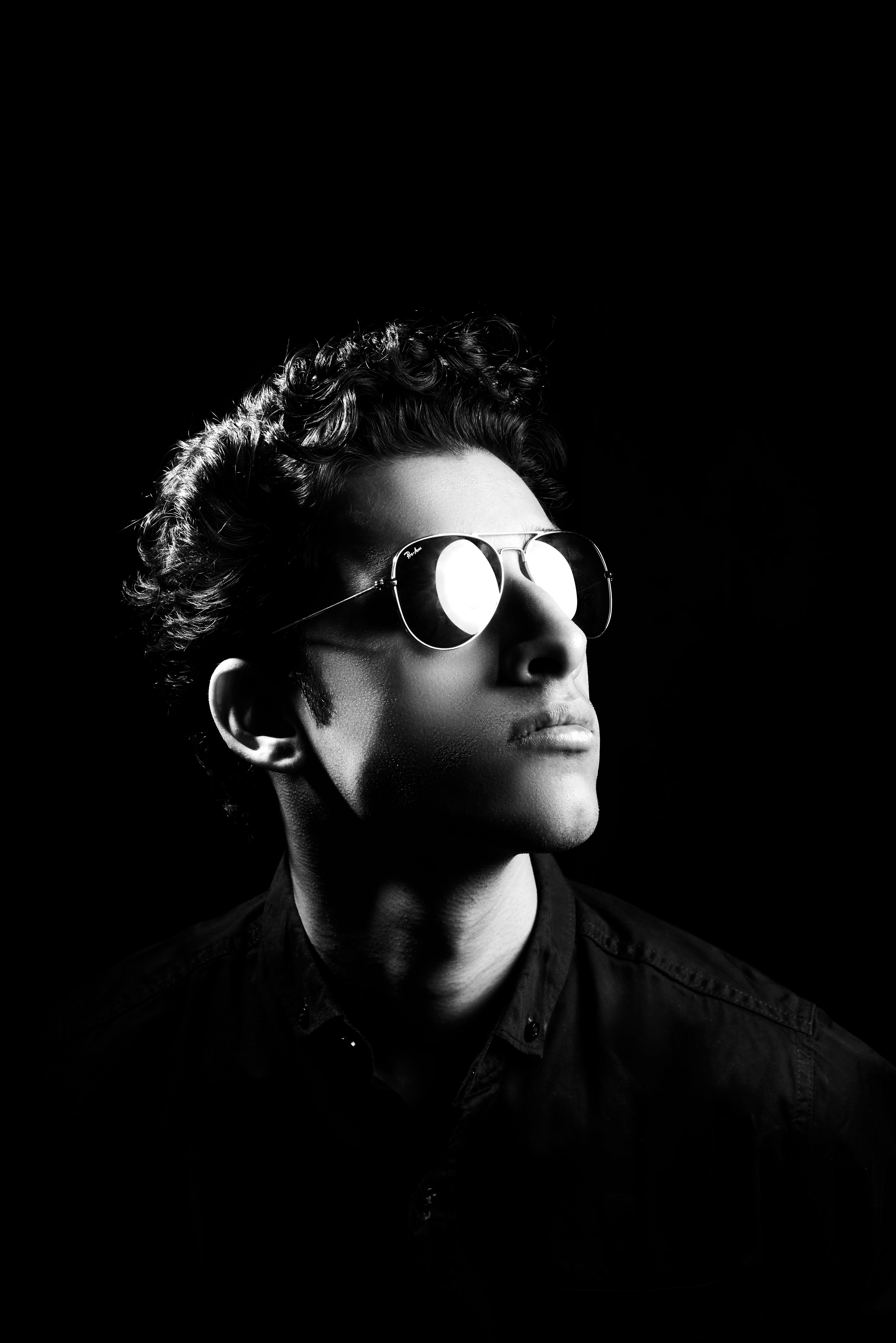 Classic black and white fashion portrait with high-contrast lighting in Mumbai