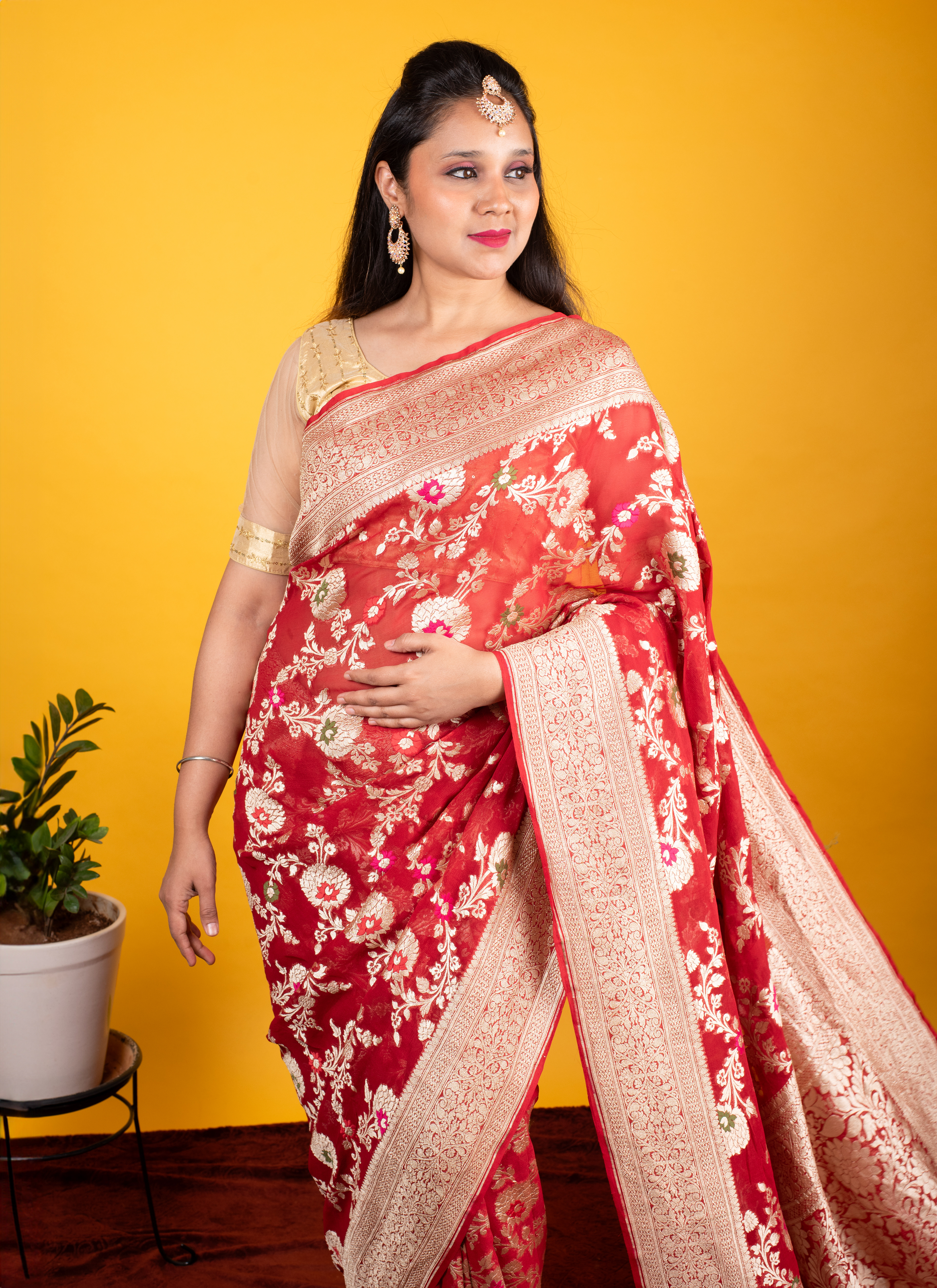 Commercial lifestyle photoshoot featuring model in designer Banarasi wear