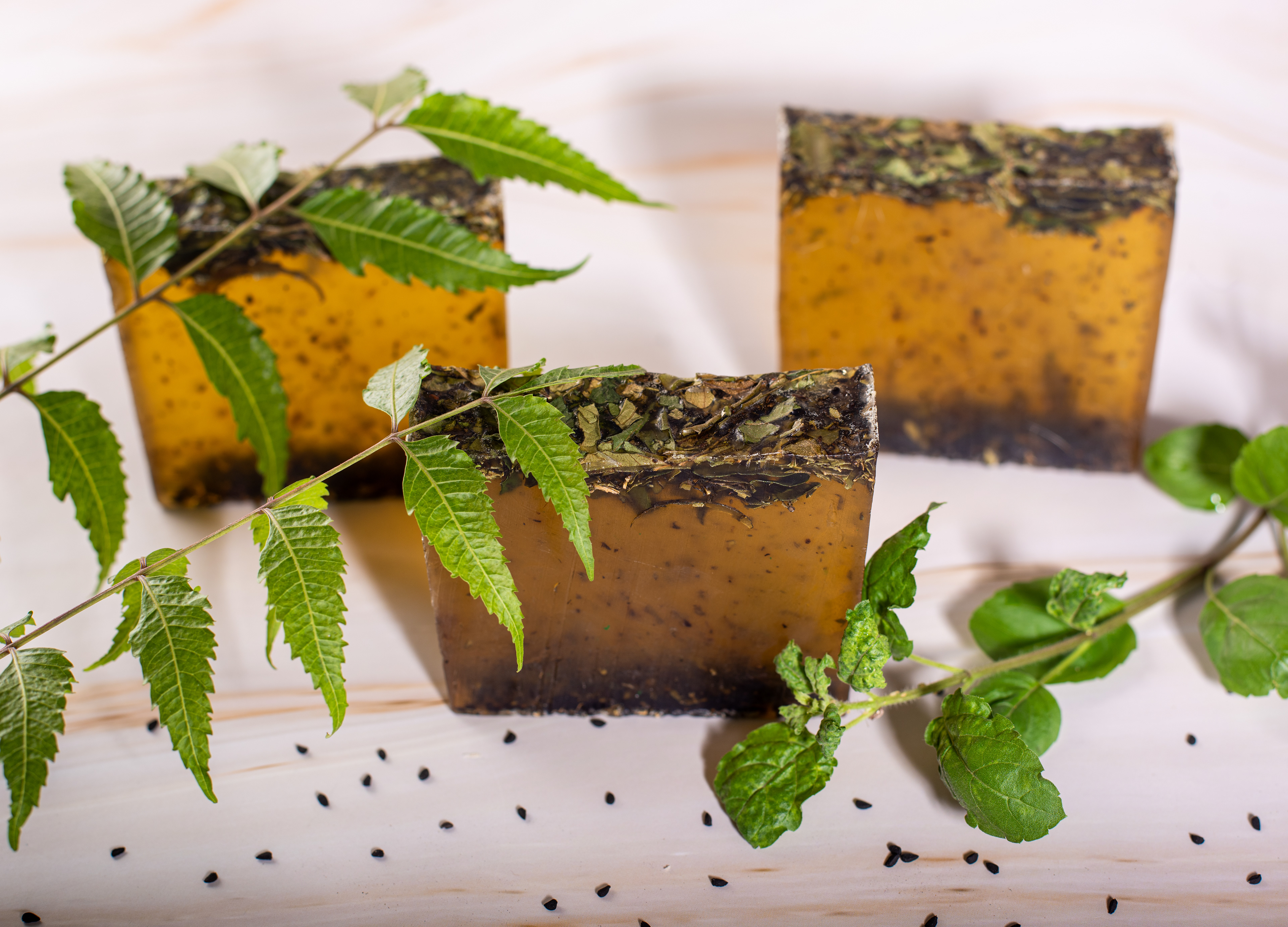 Creative flat lay of luxury handmade soaps highlighting brand aesthetics.