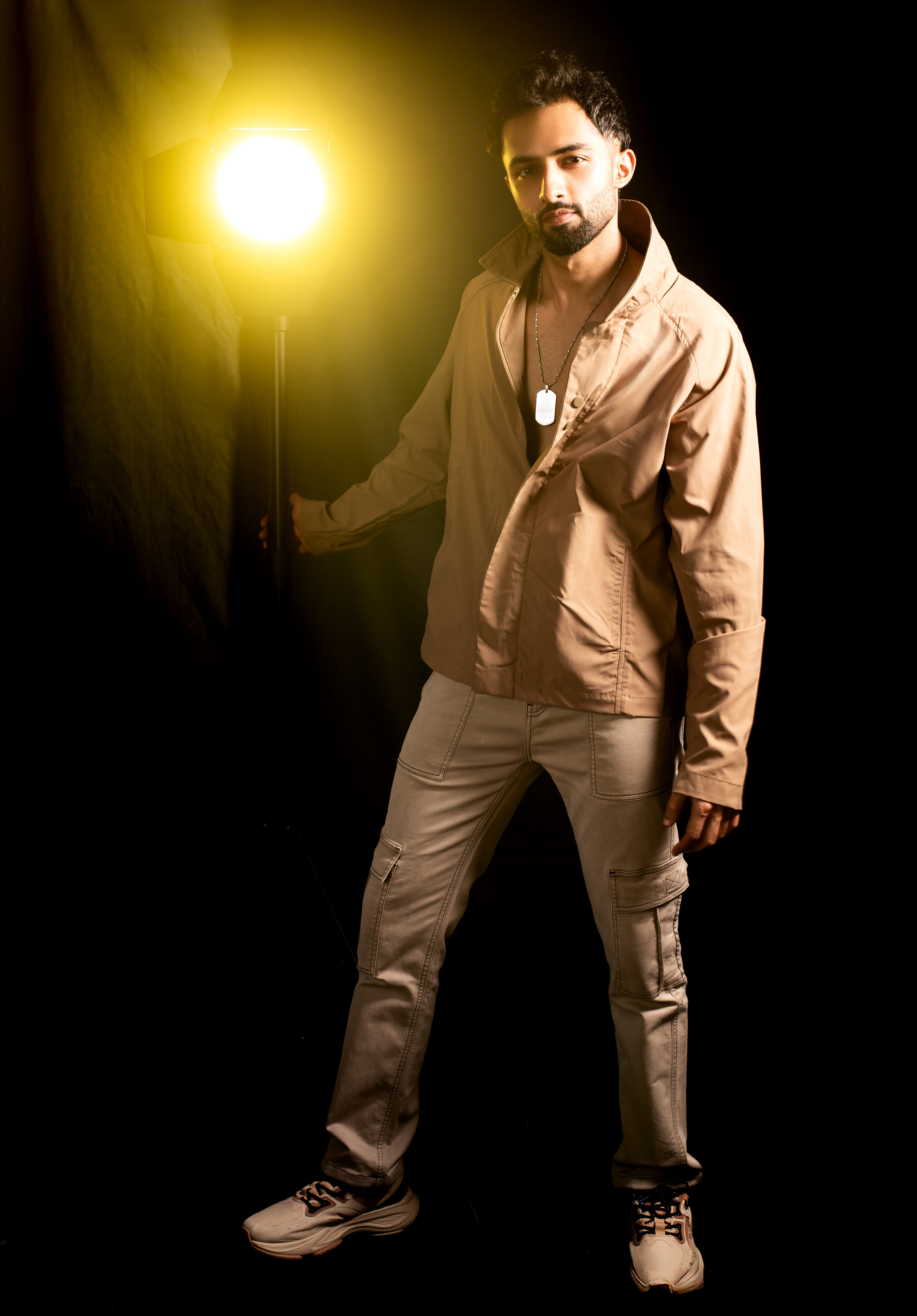 Editorial campaign-style shoot with bold makeup and fashion-forward styling