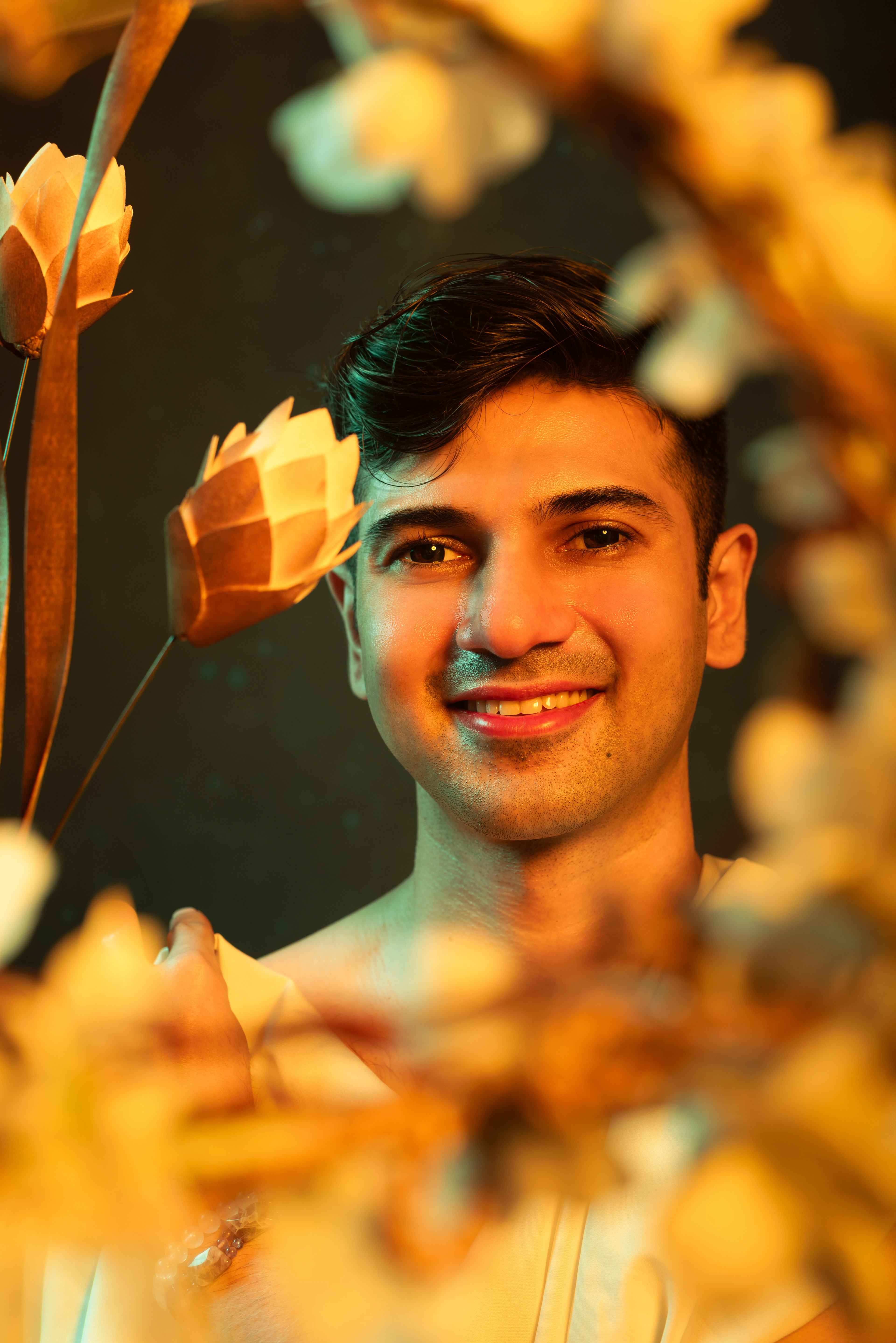 Model posing in minimalist setting wearing couture, shot by Argho Photography