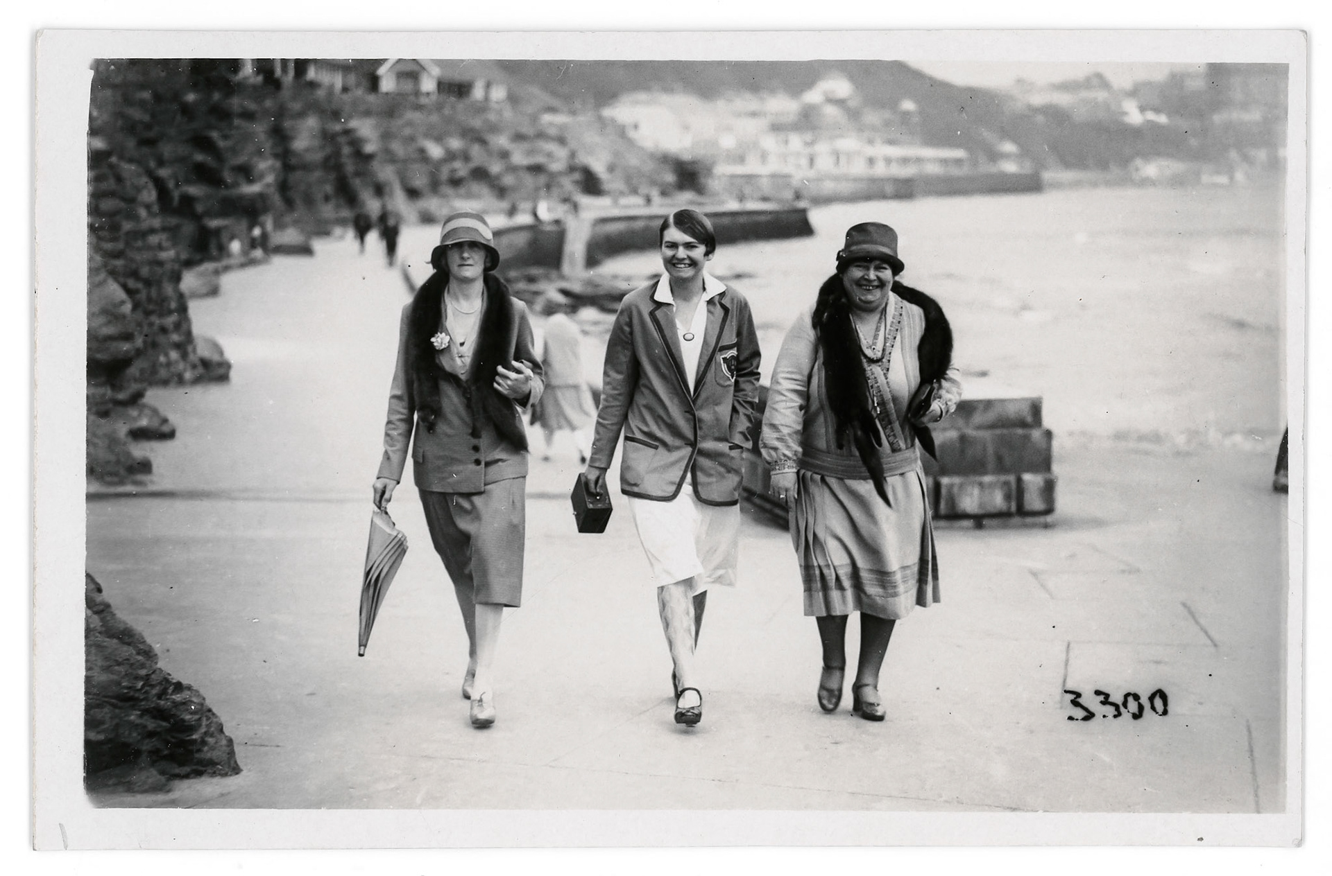 Sun Ray Photo Co., Scarborough, E. Yorkshire, c 1920s. Walking picture taken in Scarborough, a touristy location since opening railway link between Manchester and Leeds, mid 1800s.