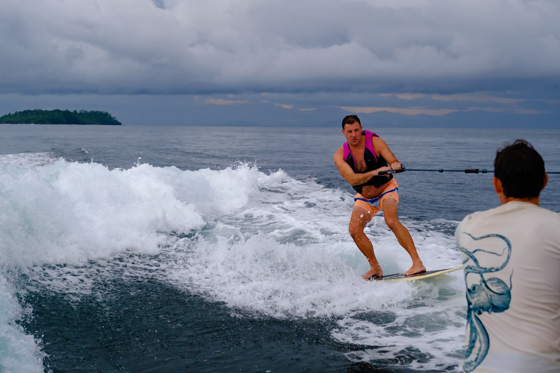 Wake surfing in the Pacific