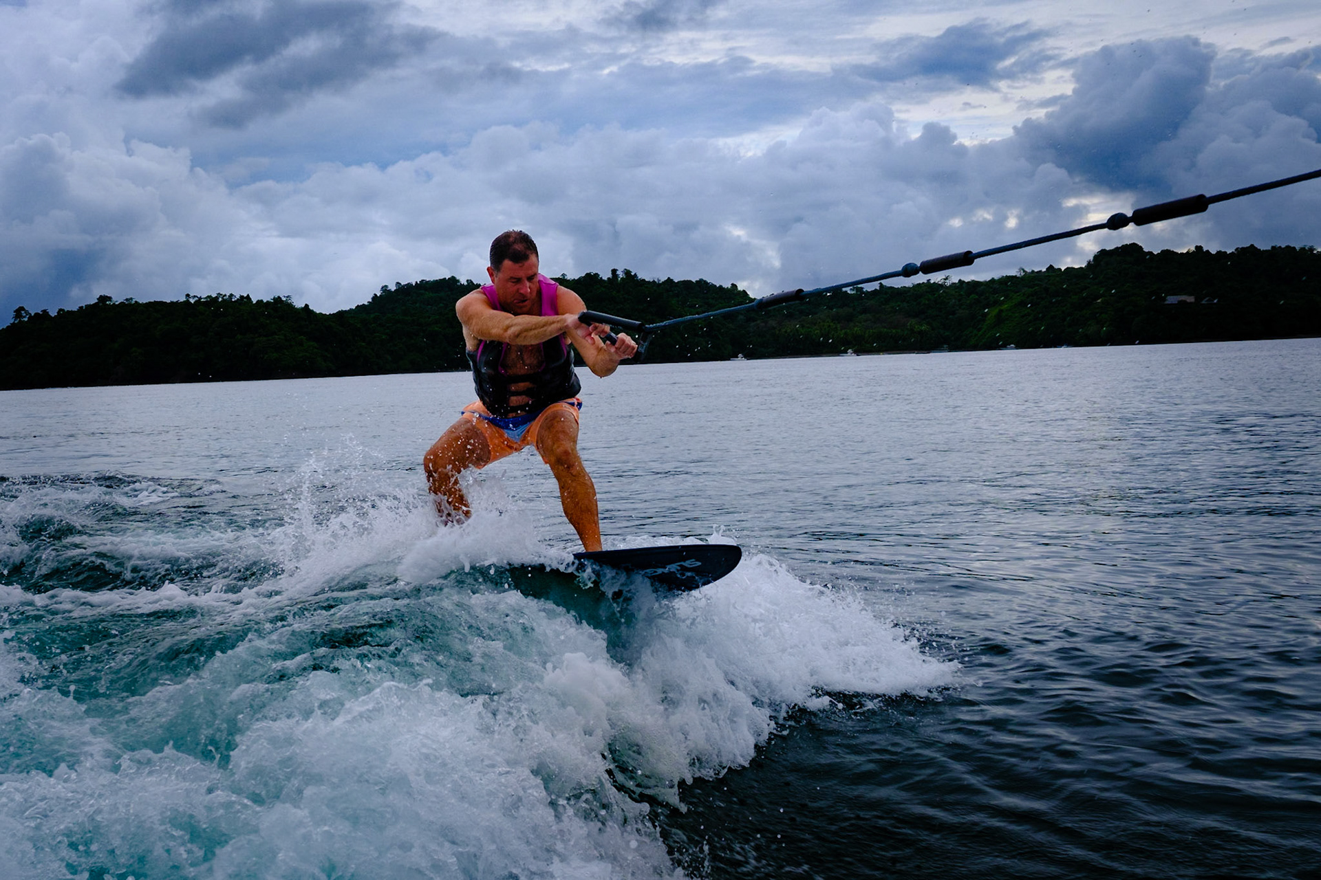 Wake surfing in the Pacific