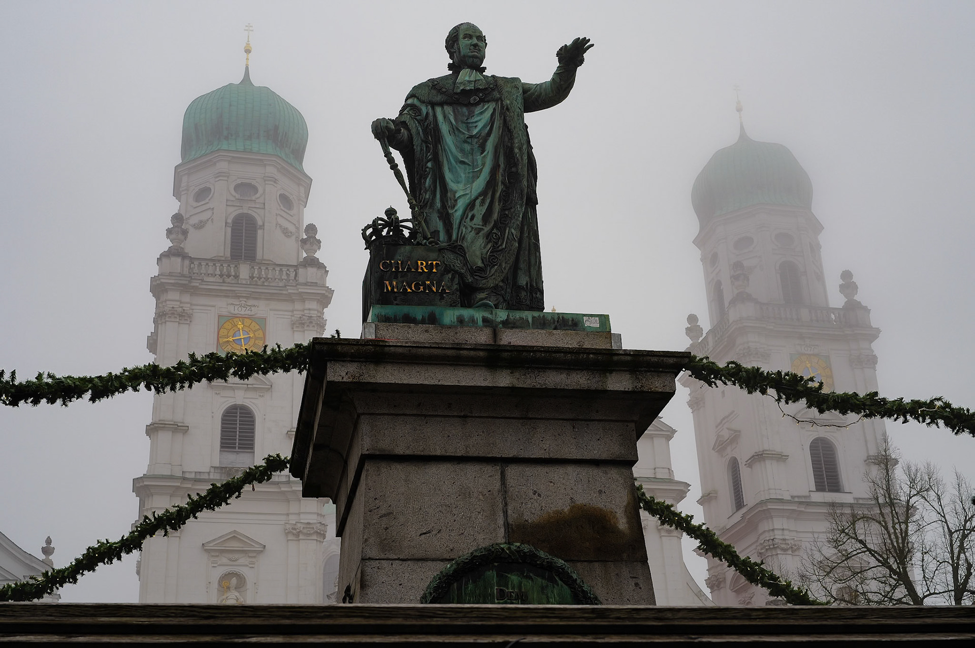 Traditional German Christmas market held annually during Advent in front of St. Stephen's Cathedral (Stephansdom) in Passau, Bavaria