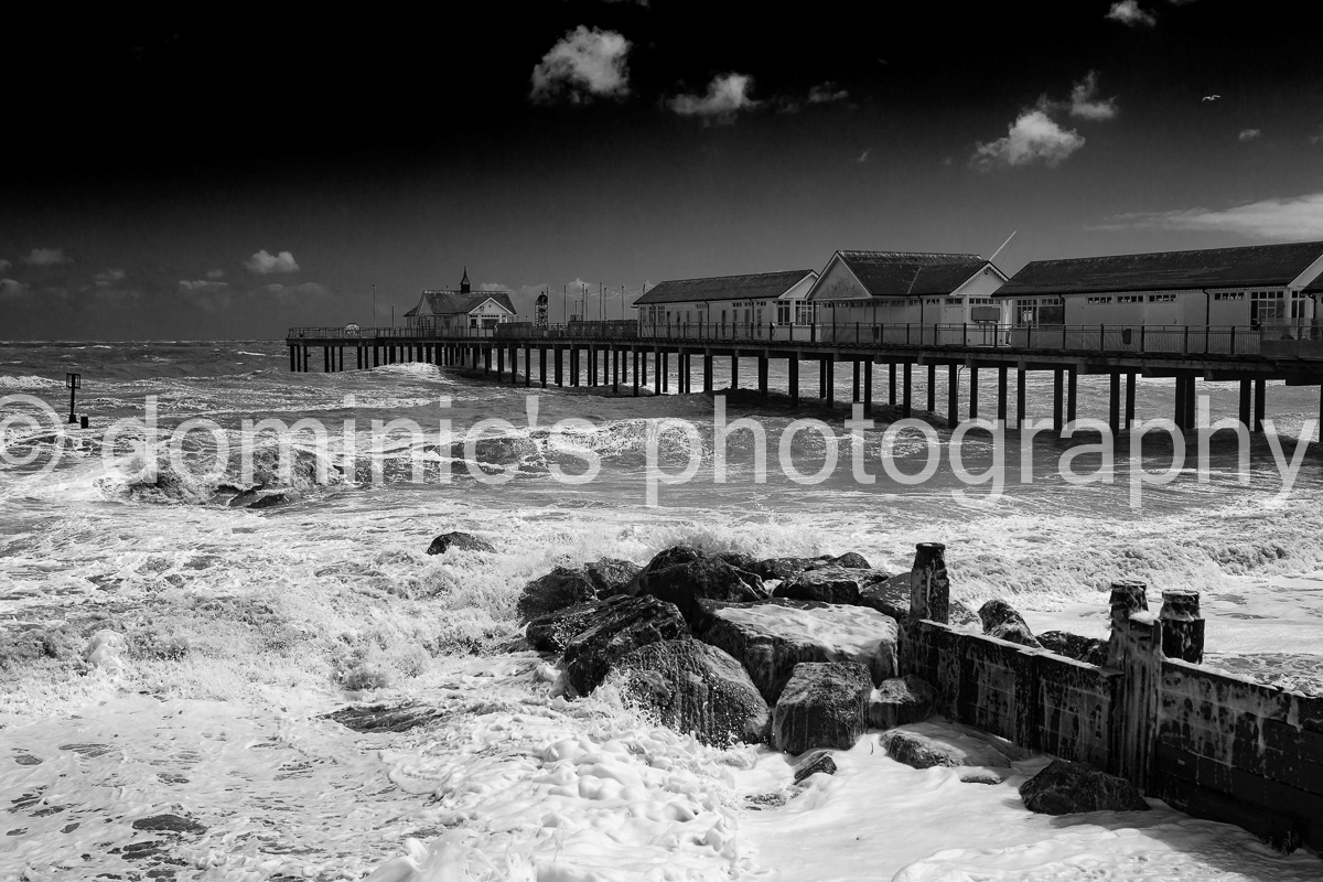 pier stormy bw